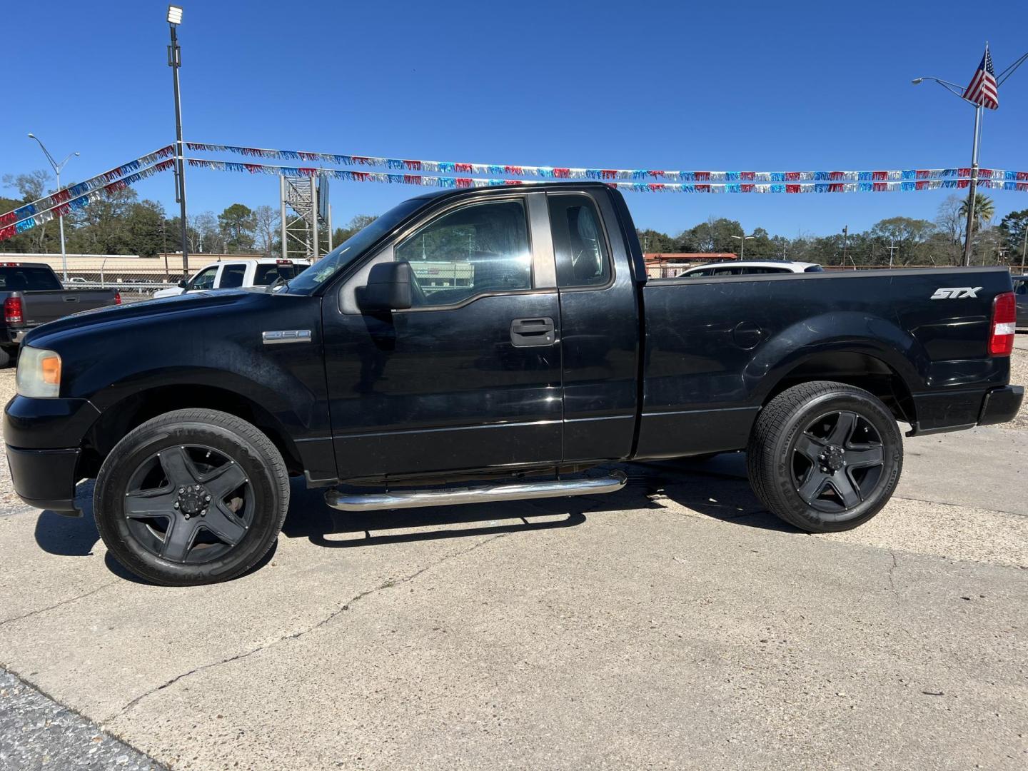 2007 Black Ford F-150 STX (1FTRF12207K) with an 4.2L V6 engine, Automatic transmission, located at 4520 Airline Hwy, Baton Rouge, LA, 70805, (225) 357-1497, 30.509325, -91.145432 - 2007 Ford F-150 Reg Cab STX 4.2L V6 Gas, Automatic, A/C & Heat, Power Windows & Locks, 20" Wheels With New Tires. FOR INFO PLEASE CONTACT JEFF AT 225-413-0981. CHECK OUT OUR A+ RATING WITH THE BETTER BUSINESS BUREAU. WE HAVE BEEN A FAMILY OWNED AND OPERATED BUSINESS AT THE SAME LOCATION FOR OVER 35 - Photo#1
