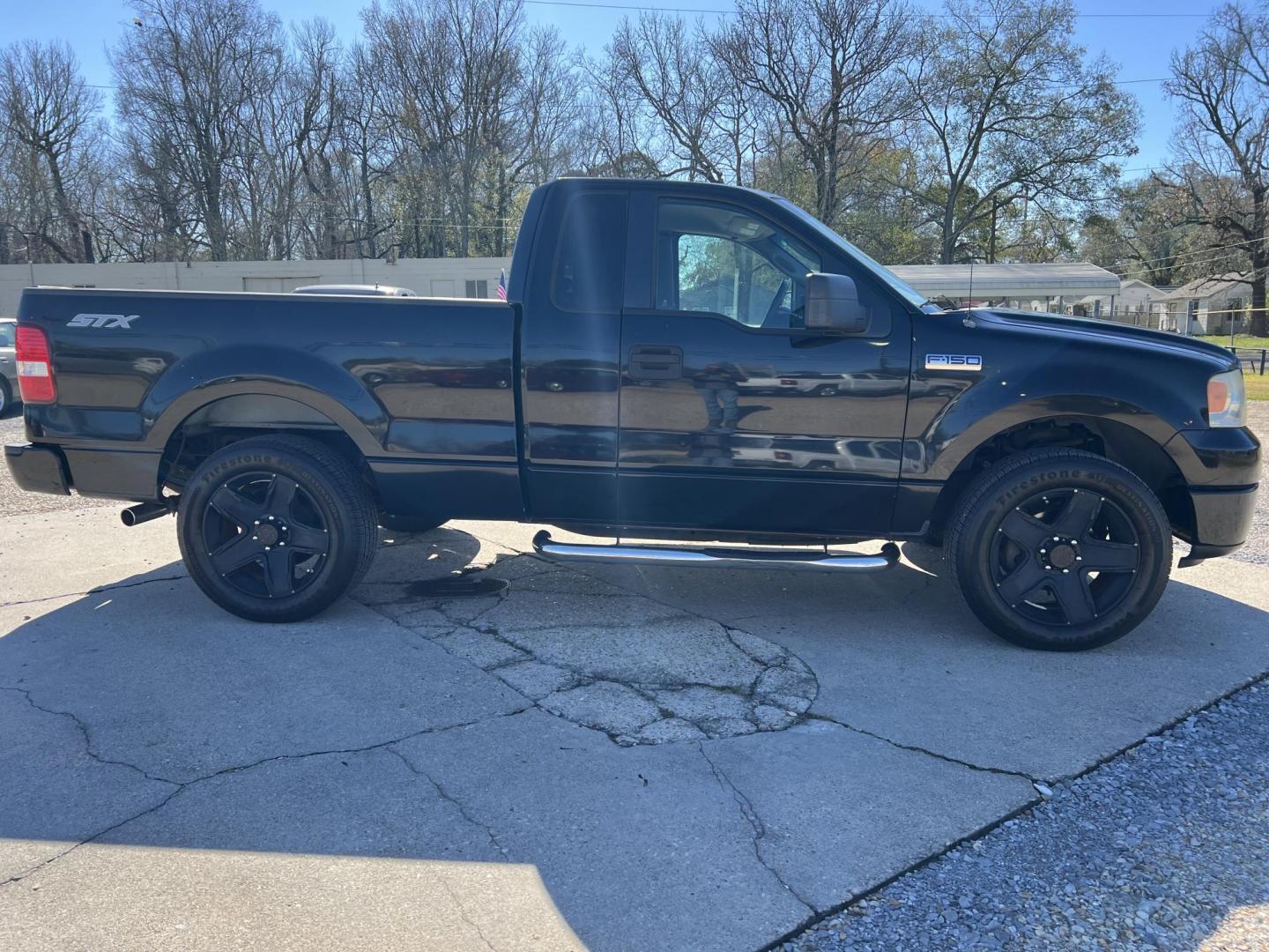 2007 Black Ford F-150 STX (1FTRF12207K) with an 4.2L V6 engine, Automatic transmission, located at 4520 Airline Hwy, Baton Rouge, LA, 70805, (225) 357-1497, 30.509325, -91.145432 - 2007 Ford F-150 Reg Cab STX 4.2L V6 Gas, Automatic, A/C & Heat, Power Windows & Locks, 20" Wheels With New Tires. FOR INFO PLEASE CONTACT JEFF AT 225-413-0981. CHECK OUT OUR A+ RATING WITH THE BETTER BUSINESS BUREAU. WE HAVE BEEN A FAMILY OWNED AND OPERATED BUSINESS AT THE SAME LOCATION FOR OVER 35 - Photo#4