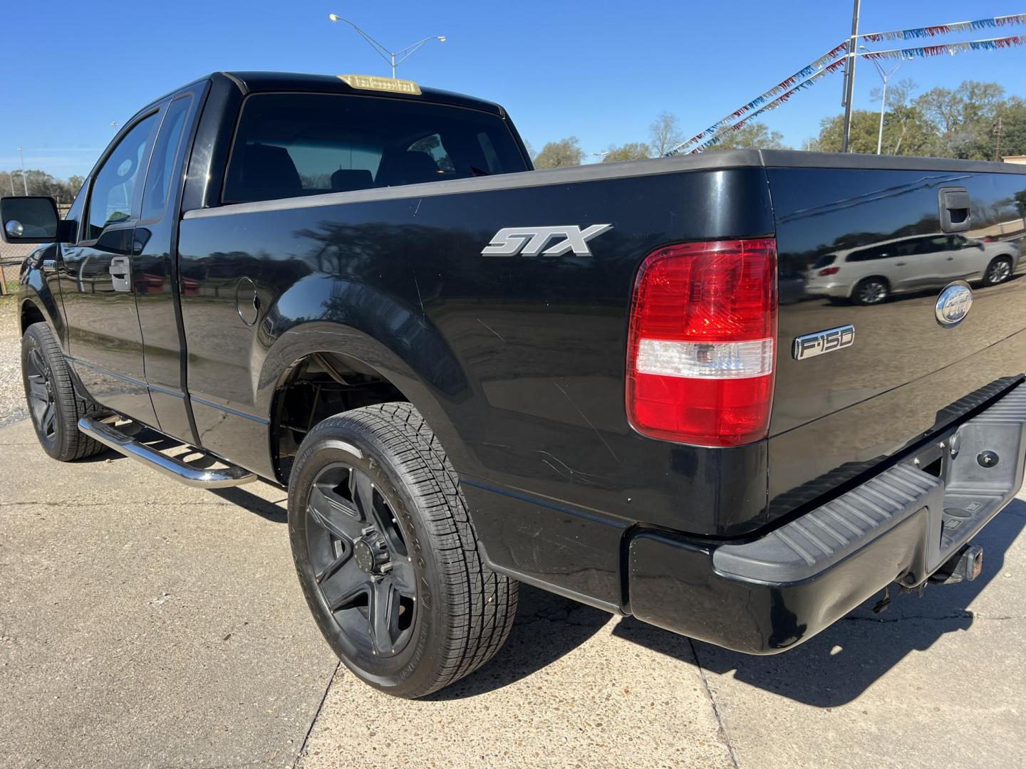 2007 Black Ford F-150 STX (1FTRF12207K) with an 4.2L V6 engine, Automatic transmission, located at 4520 Airline Hwy, Baton Rouge, LA, 70805, (225) 357-1497, 30.509325, -91.145432 - 2007 Ford F-150 Reg Cab STX 4.2L V6 Gas, Automatic, A/C & Heat, Power Windows & Locks, 20" Wheels With New Tires. FOR INFO PLEASE CONTACT JEFF AT 225-413-0981. CHECK OUT OUR A+ RATING WITH THE BETTER BUSINESS BUREAU. WE HAVE BEEN A FAMILY OWNED AND OPERATED BUSINESS AT THE SAME LOCATION FOR OVER 35 - Photo#7