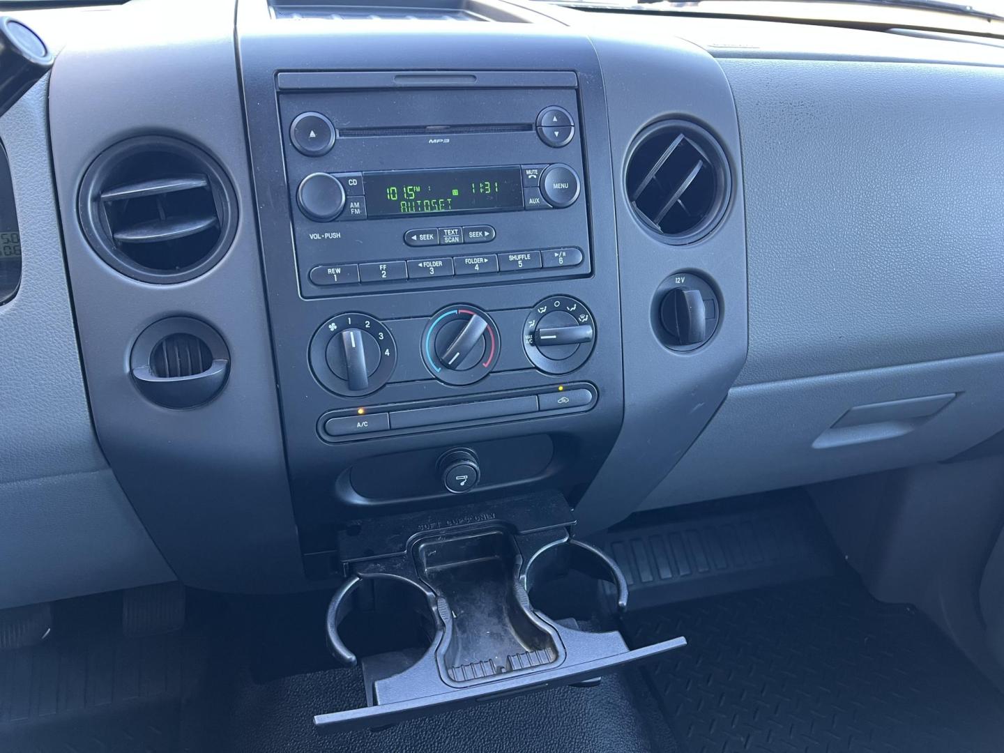 2007 Black Ford F-150 STX (1FTRF12207K) with an 4.2L V6 engine, Automatic transmission, located at 4520 Airline Hwy, Baton Rouge, LA, 70805, (225) 357-1497, 30.509325, -91.145432 - 2007 Ford F-150 Reg Cab STX 4.2L V6 Gas, Automatic, A/C & Heat, Power Windows & Locks, 20" Wheels With New Tires. FOR INFO PLEASE CONTACT JEFF AT 225-413-0981. CHECK OUT OUR A+ RATING WITH THE BETTER BUSINESS BUREAU. WE HAVE BEEN A FAMILY OWNED AND OPERATED BUSINESS AT THE SAME LOCATION FOR OVER 35 - Photo#9