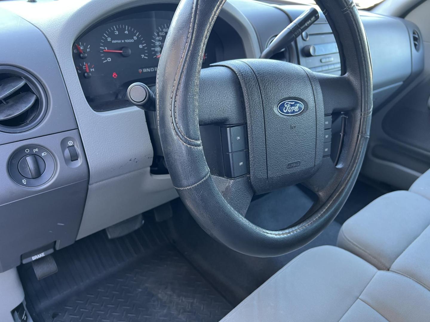 2007 Black Ford F-150 STX (1FTRF12207K) with an 4.2L V6 engine, Automatic transmission, located at 4520 Airline Hwy, Baton Rouge, LA, 70805, (225) 357-1497, 30.509325, -91.145432 - 2007 Ford F-150 Reg Cab STX 4.2L V6 Gas, Automatic, A/C & Heat, Power Windows & Locks, 20" Wheels With New Tires. FOR INFO PLEASE CONTACT JEFF AT 225-413-0981. CHECK OUT OUR A+ RATING WITH THE BETTER BUSINESS BUREAU. WE HAVE BEEN A FAMILY OWNED AND OPERATED BUSINESS AT THE SAME LOCATION FOR OVER 35 - Photo#12