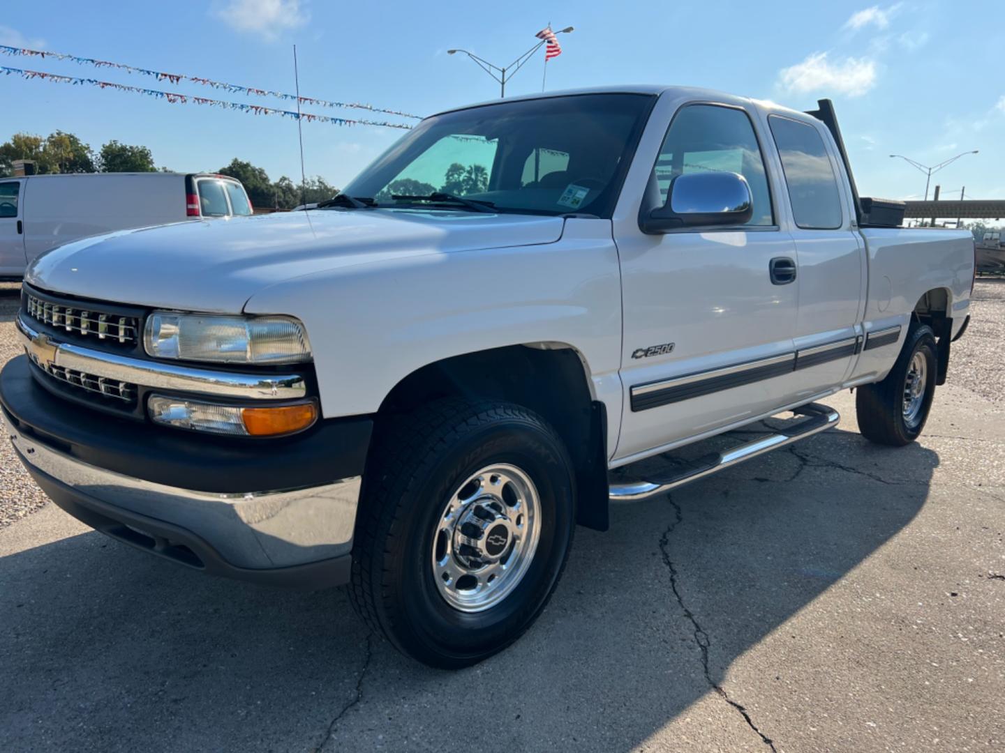 2000 White /Gray Chevrolet Silverado 2500 LS (1GCFC29U3YE) with an 6.0L V8 Gas engine, Automatic transmission, located at 4520 Airline Hwy, Baton Rouge, LA, 70805, (225) 357-1497, 30.509325, -91.145432 - 2000 Chevy Silverado 2500 Ext Cab LS 2WD 6.0 V8 Gas, 210K Miles, Power Windows, Locks & Mirrors, Cold A/C, Spray In Bedliner, Good Tires, Tow Pkg. FOR INFO PLEASE CONTACT JEFF AT 225 357-1497 CHECK OUT OUR A+ RATING WITH THE BETTER BUSINESS BUREAU WE HAVE BEEN A FAMILY OWNED AND OPERATED BUSINESS A - Photo#0