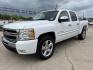 2010 White /Black Chevrolet Silverado 1500 LT1 (3GCRCSE02AG) with an 5.3L V8 engine, 4-Speed Automatic transmission, located at 4520 Airline Hwy, Baton Rouge, LA, 70805, (225) 357-1497, 30.509325, -91.145432 - 2010 Chevrolet Silverado 1500 Crew Cab LT 5.3L V8, 210K Miles, Cold A/C, Power Running Boards, Spray In Liner, 20" factory alloy wheels. FOR INFO PLEASE CONTACT JEFF AT 225-413-098CHECK OUT OUR A+ RATING WITH THE BETTER BUSINESS BUREAU. WE HAVE BEEN A FAMILY OWNED AND OPERATED BUSINESS AT THE SAME L - Photo#0