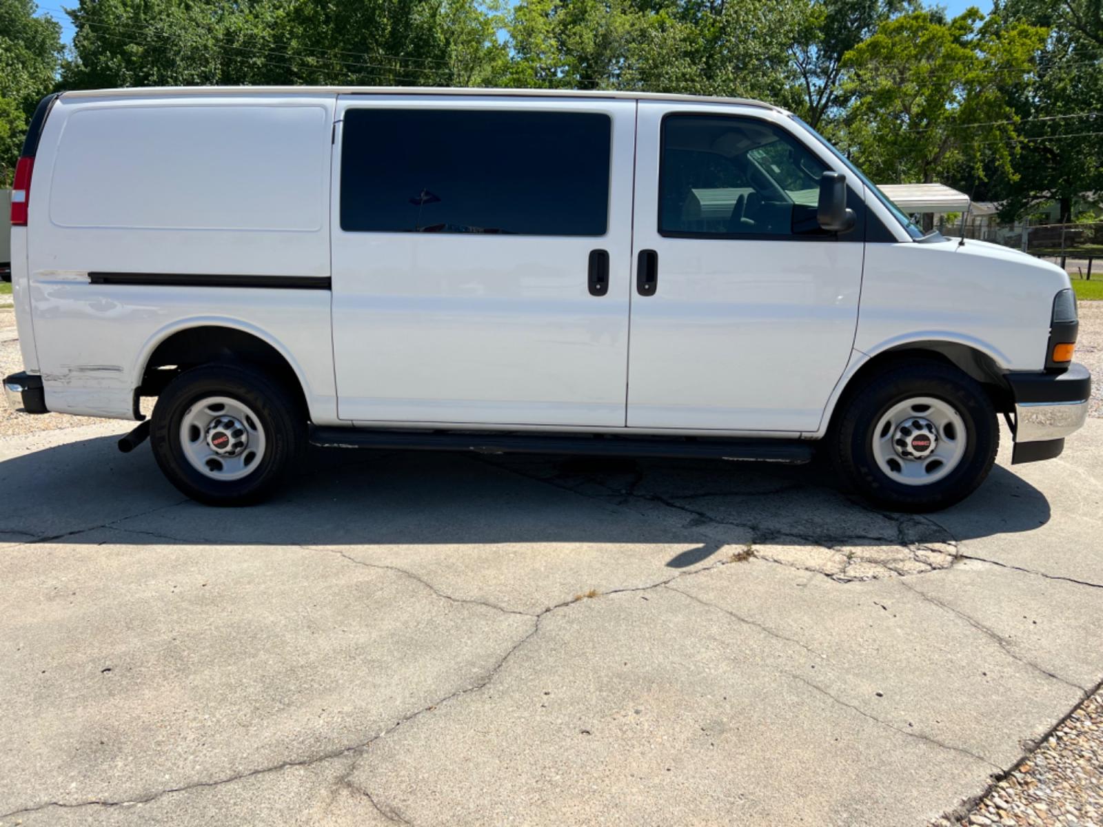 2017 White GMC Savana G2500 Cargo (1GTW7AFF7H1) with an 4.8L V8 FFV engine, Automatic transmission, located at 4520 Airline Hwy, Baton Rouge, LA, 70805, (225) 357-1497, 30.509325, -91.145432 - 2017 GMC Savana Van 4.8 V8, 173K Miles, Auto, A/C, Power Windows & Locks, This Is A Work Van, Minor Damage On Right Rear & Front Fender Has Small Dent. NO IN HOUSE FINANCING. FOR INFO PLEASE CONTACT JEFF AT 225 357-1497 CHECK OUT OUR A+ RATING WITH THE BETTER BUSINESS BUREAU. WE HAVE BEEN A FAMILY - Photo #4
