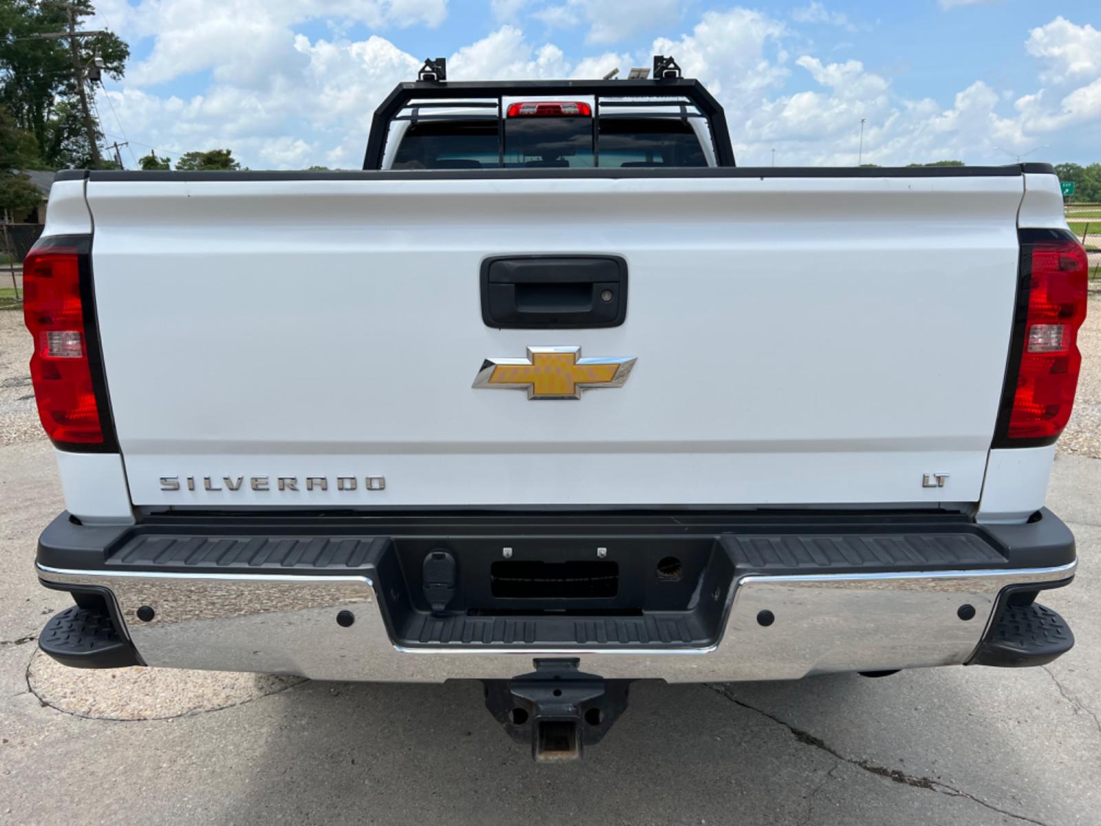 2015 White Chevrolet Silverado 2500HD LT (1GC0KVEG4FZ) with an 6.0L V8 OHV 16V FFV engine, 6-Speed Automatic transmission, located at 4520 Airline Hwy, Baton Rouge, LA, 70805, (225) 357-1497, 30.509325, -91.145432 - 2015 Chevy 2500HD 4X4 8FT Bed, 6.0 V8 Gas, 168K Miles, Auto, A/C, Power Windows, Locks & Seat, B&W Gooseneck Hitch. This Is A Work Truck. NO IN HOUSE FINANCING. FOR INFO PLEASE CONTACT JEFF AT 225 357-1497 CHECK OUT OUR A+ RATING WITH THE BETTER BUSINESS BUREAU. WE HAVE BEEN A FAMILY OWNED AND OPER - Photo #6