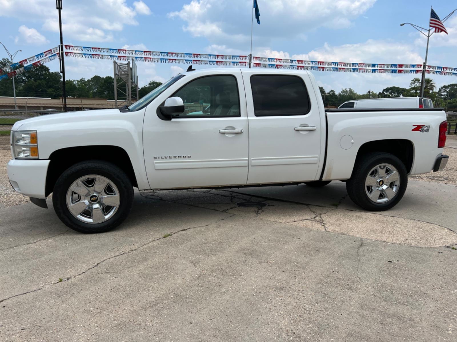 2012 White /Tan Chevrolet Silverado 1500 LTZ (3GCPKTE22CG) with an 6.2L V8 OHV 16V FFV engine, 6-Speed Automatic transmission, located at 4520 Airline Hwy, Baton Rouge, LA, 70805, (225) 357-1497, 30.509325, -91.145432 - 2012 Chevy Crew Cab LTZ 4X4 6.2 V8 Gas, 205K Miles, Auto, A/C, Heated Leather Seats, Bose, All Power, Backup Camera, Tow Pkg. NO IN HOUSE FINANCING. FOR INFO PLEASE CONTACT JEFF AT 225 357-1497 CHECK OUT OUR A+ RATING WITH THE BETTER BUSINESS BUREAU. WE HAVE BEEN A FAMILY OWNED AND OPERATED BUSIN - Photo #1