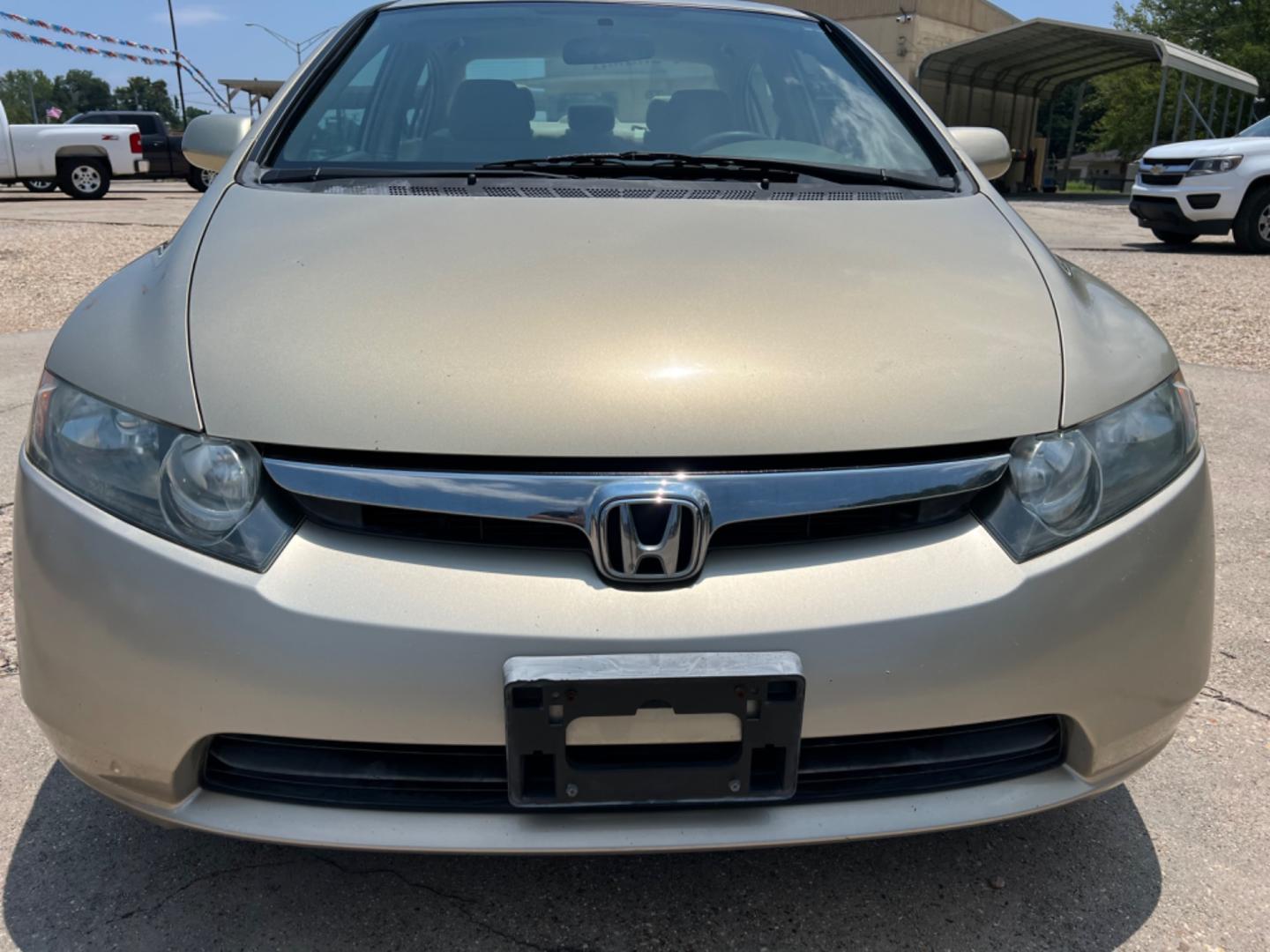 2008 Tan /Tan Honda Civic LX (1HGFA16578L) with an 1.8L Gas engine, Automatic transmission, located at 4520 Airline Hwy, Baton Rouge, LA, 70805, (225) 357-1497, 30.509325, -91.145432 - 2008 Honda Civic LX 1.8L ***ONLY 48K MILES*** 4Cylinder Gas Saver, Automatic, Power Windows & Locks, Cold A/C, No Accidents But It Does Have A Dent On Top (See Pic). FOR INFO PLEASE CONTACT JEFF AT 225 357-1497 CHECK OUT OUR A+ RATING WITH THE BETTER BUSINESS BUREAU WE HAVE BEEN A FAMILY OWNED AND O - Photo#2