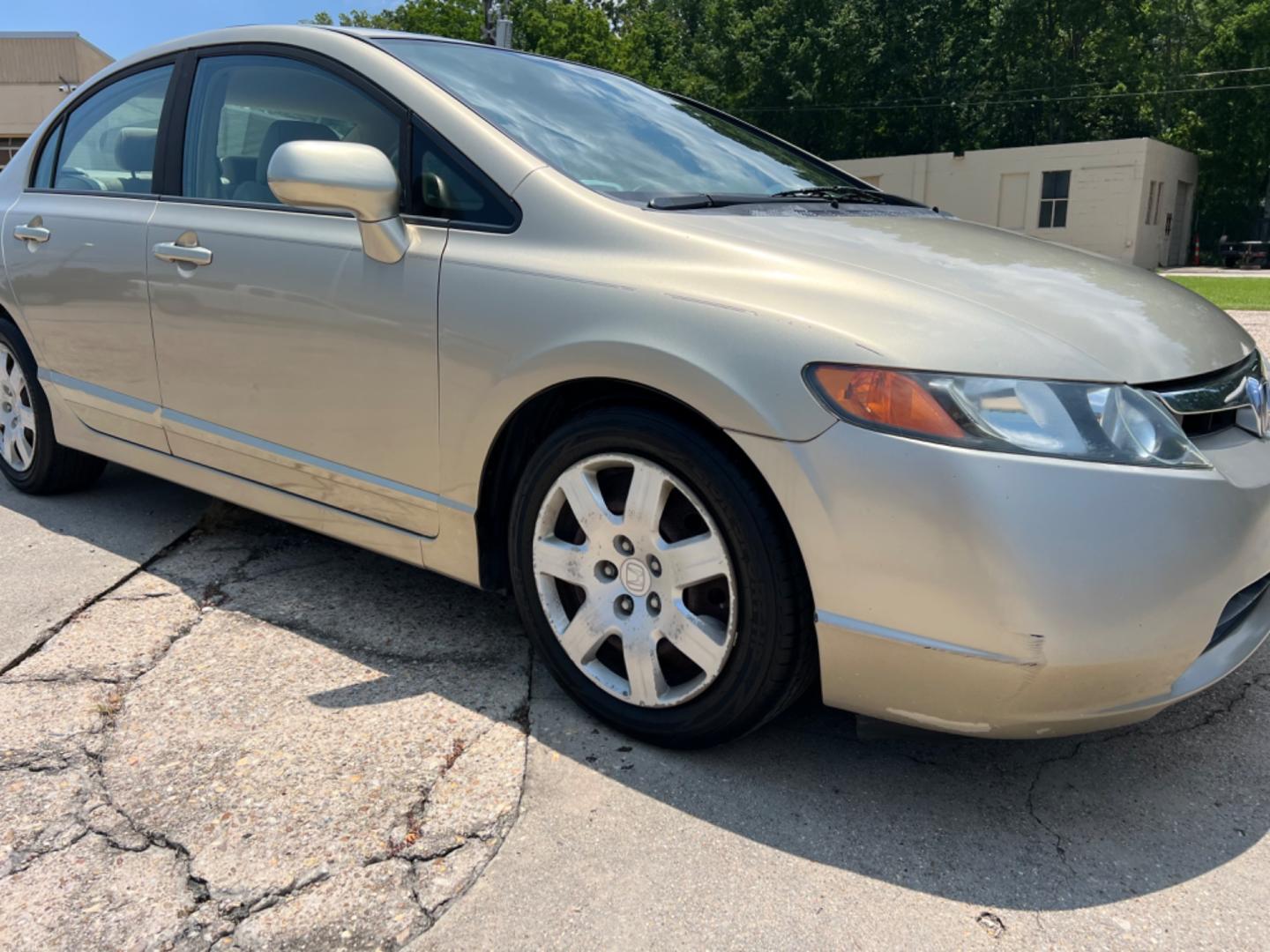 2008 Tan /Tan Honda Civic LX (1HGFA16578L) with an 1.8L Gas engine, Automatic transmission, located at 4520 Airline Hwy, Baton Rouge, LA, 70805, (225) 357-1497, 30.509325, -91.145432 - 2008 Honda Civic LX 1.8L ***ONLY 48K MILES*** 4Cylinder Gas Saver, Automatic, Power Windows & Locks, Cold A/C, No Accidents But It Does Have A Dent On Top (See Pic). FOR INFO PLEASE CONTACT JEFF AT 225 357-1497 CHECK OUT OUR A+ RATING WITH THE BETTER BUSINESS BUREAU WE HAVE BEEN A FAMILY OWNED AND O - Photo#3