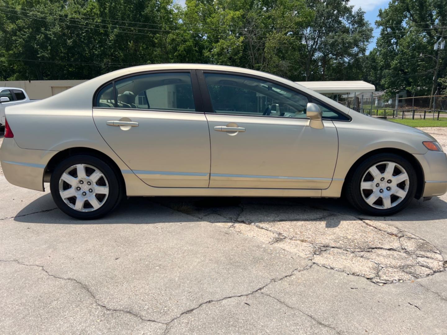 2008 Tan /Tan Honda Civic LX (1HGFA16578L) with an 1.8L Gas engine, Automatic transmission, located at 4520 Airline Hwy, Baton Rouge, LA, 70805, (225) 357-1497, 30.509325, -91.145432 - 2008 Honda Civic LX 1.8L ***ONLY 48K MILES*** 4Cylinder Gas Saver, Automatic, Power Windows & Locks, Cold A/C, No Accidents But It Does Have A Dent On Top (See Pic). FOR INFO PLEASE CONTACT JEFF AT 225 357-1497 CHECK OUT OUR A+ RATING WITH THE BETTER BUSINESS BUREAU WE HAVE BEEN A FAMILY OWNED AND O - Photo#4