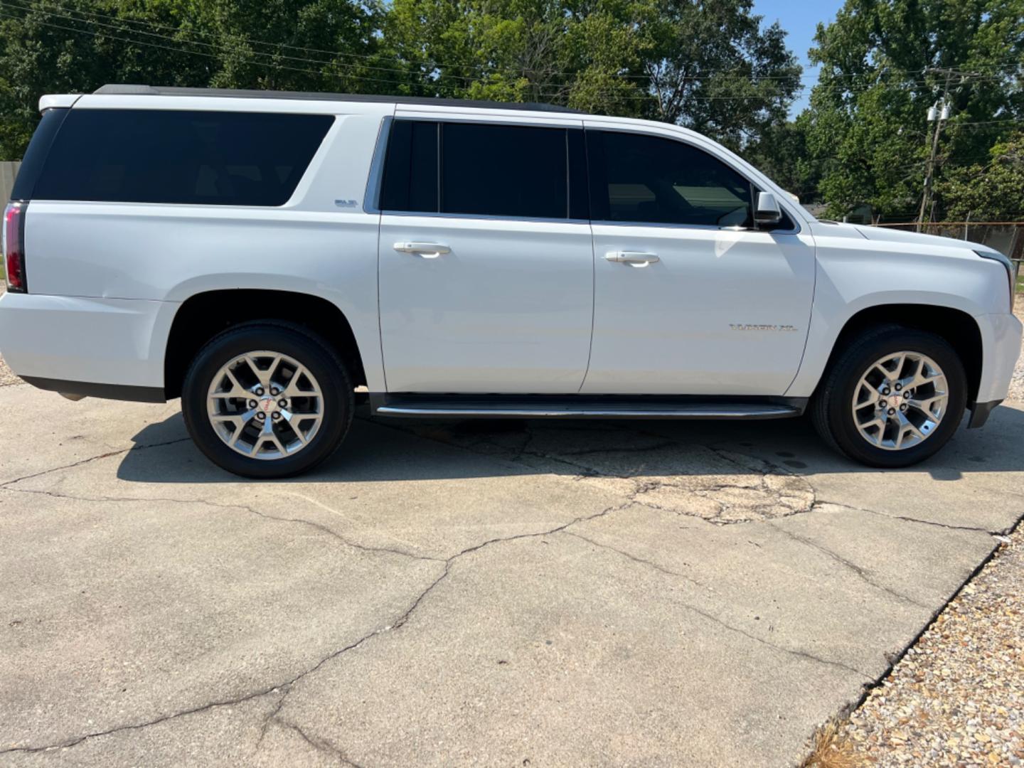 2015 White /Tan GMC Yukon XL SLT (1GKS1HKC5FR) with an 5.3L V8 engine, 6-Speed Automatic transmission, located at 4520 Airline Hwy, Baton Rouge, LA, 70805, (225) 357-1497, 30.509325, -91.145432 - 2015 GMC Yukon XL SLT 2WD ***No Accidents & Two Owner*** 5.3 V8 Gas, 177K Miles, Heated & Cooled Leather, Seats 7, Sunroof, Dual DVD, Bose, Backup Camera, Power Lift Gate, Tow Pkg. FOR INFO PLEASE CONTACT JEFF AT 225 357-1497 CHECK OUT OUR A+ RATING WITH THE BETTER BUSINESS BUREAU WE HAVE BEEN A FAM - Photo#4