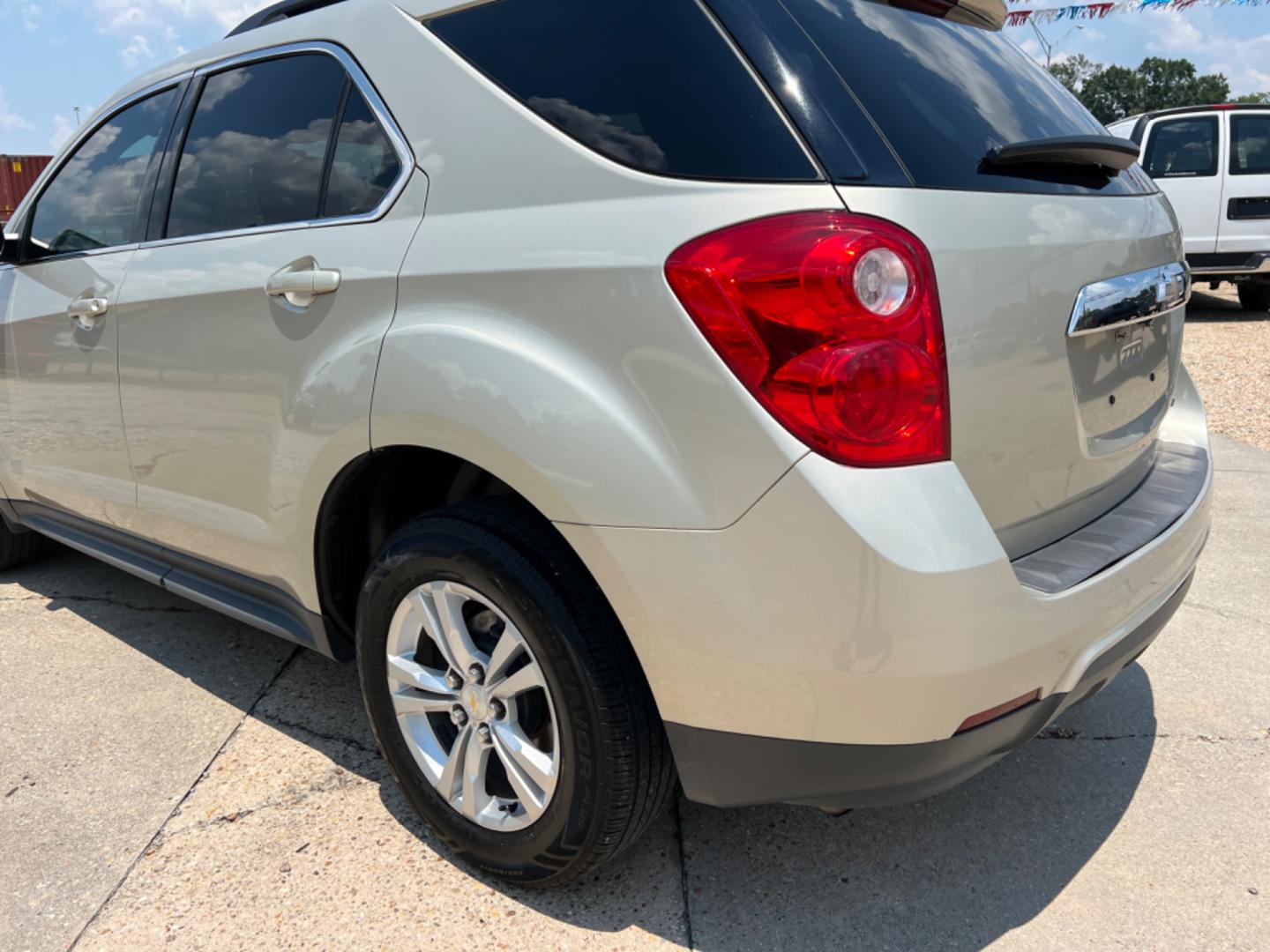 2013 Tan /Gray Chevrolet Equinox LT (2GNALDEK1D6) with an 2.4L 4 Cylinder engine, Automatic transmission, located at 4520 Airline Hwy, Baton Rouge, LA, 70805, (225) 357-1497, 30.509325, -91.145432 - 2013 Chevy Equinox LT 2.4LGas, 130K Miles, Power Windows, Locks & Mirrors, Cold A/C. FOR INFO PLEASE CONTACT JEFF AT 225 357-1497 CHECK OUT OUR A+ RATING WITH THE BETTER BUSINESS BUREAU WE HAVE BEEN A FAMILY OWNED AND OPERATED BUSINESS AT THE SAME LOCATION FOR OVER 45 YEARS. WE STRIVE TO KEEP CUS - Photo#7