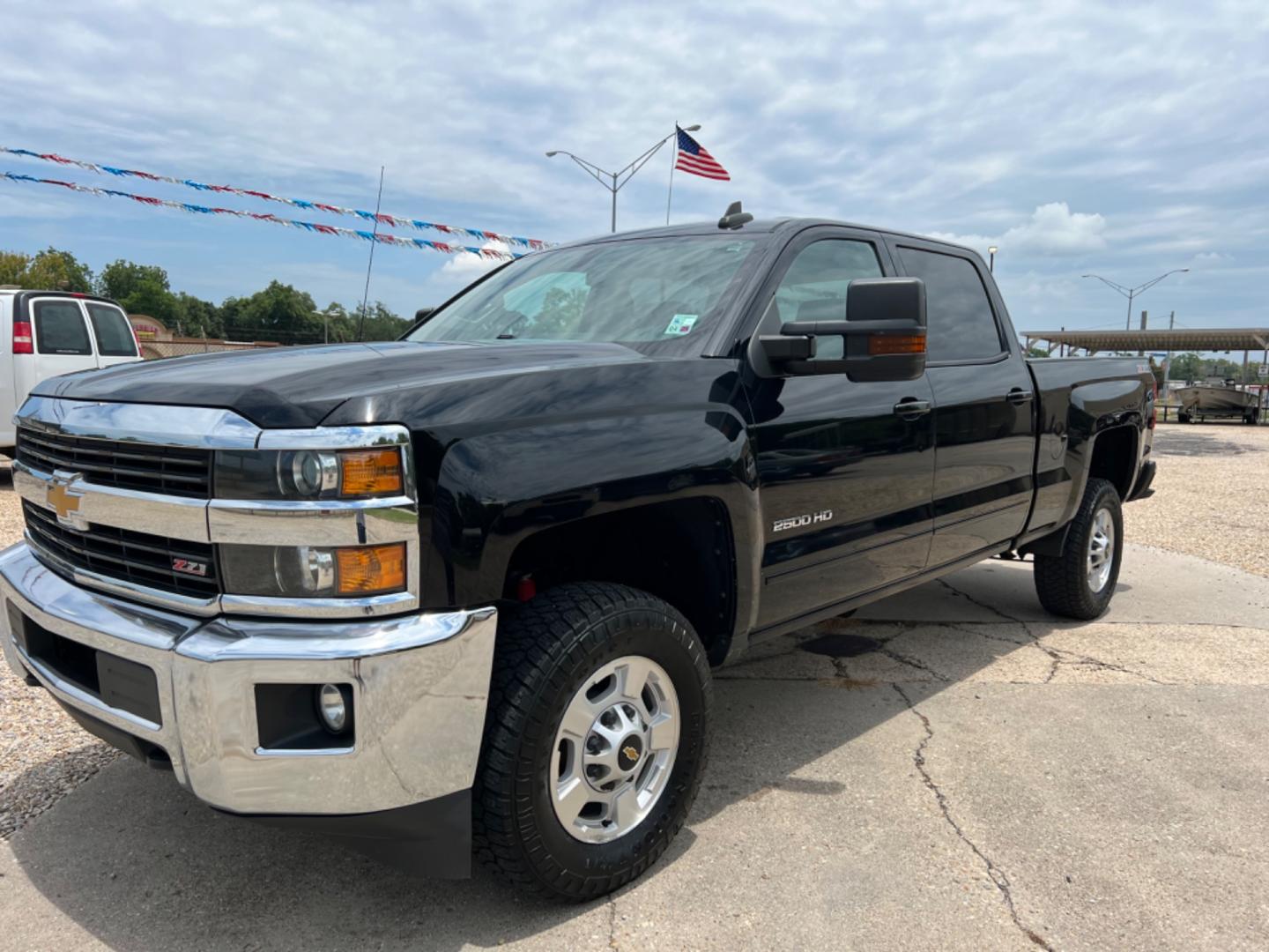 2017 Black /Black Chevrolet Silverado 2500HD LT (1GC1KVEG3HF) with an 6.0L V8 Gas engine, 6-Speed Automatic transmission, located at 4520 Airline Hwy, Baton Rouge, LA, 70805, (225) 357-1497, 30.509325, -91.145432 - 2017 Chevy Silverado 2500HD Crew Cab LT 4WD ***One Owner*** 6.0 V8 Gas, 188K Miles, Power Windows, Locks & Mirrors, Cold A/C, Spray In Bedliner, Backup Camera, Tow Pkg. FOR INFO PLEASE CONTACT JEFF AT 225 357-1497 CHECK OUT OUR A+ RATING WITH THE BETTER BUSINESS BUREAU WE HAVE BEEN A FAMILY OWNED AN - Photo#0