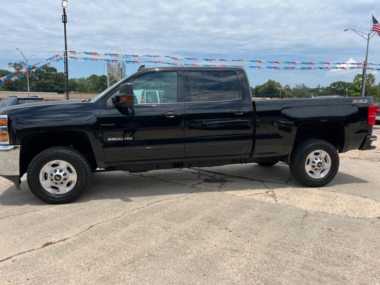 2017 Black /Black Chevrolet Silverado 2500HD LT (1GC1KVEG3HF) with an 6.0L V8 Gas engine, 6-Speed Automatic transmission, located at 4520 Airline Hwy, Baton Rouge, LA, 70805, (225) 357-1497, 30.509325, -91.145432 - 2017 Chevy Silverado 2500HD Crew Cab LT 4WD ***One Owner*** 6.0 V8 Gas, 188K Miles, Power Windows, Locks & Mirrors, Cold A/C, Spray In Bedliner, Backup Camera, Tow Pkg. FOR INFO PLEASE CONTACT JEFF AT 225 357-1497 CHECK OUT OUR A+ RATING WITH THE BETTER BUSINESS BUREAU WE HAVE BEEN A FAMILY OWNED AN - Photo#1