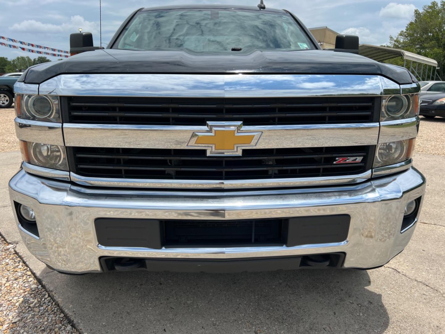 2017 Black /Black Chevrolet Silverado 2500HD LT (1GC1KVEG3HF) with an 6.0L V8 Gas engine, 6-Speed Automatic transmission, located at 4520 Airline Hwy, Baton Rouge, LA, 70805, (225) 357-1497, 30.509325, -91.145432 - 2017 Chevy Silverado 2500HD Crew Cab LT 4WD ***One Owner*** 6.0 V8 Gas, 188K Miles, Power Windows, Locks & Mirrors, Cold A/C, Spray In Bedliner, Backup Camera, Tow Pkg. FOR INFO PLEASE CONTACT JEFF AT 225 357-1497 CHECK OUT OUR A+ RATING WITH THE BETTER BUSINESS BUREAU WE HAVE BEEN A FAMILY OWNED AN - Photo#2