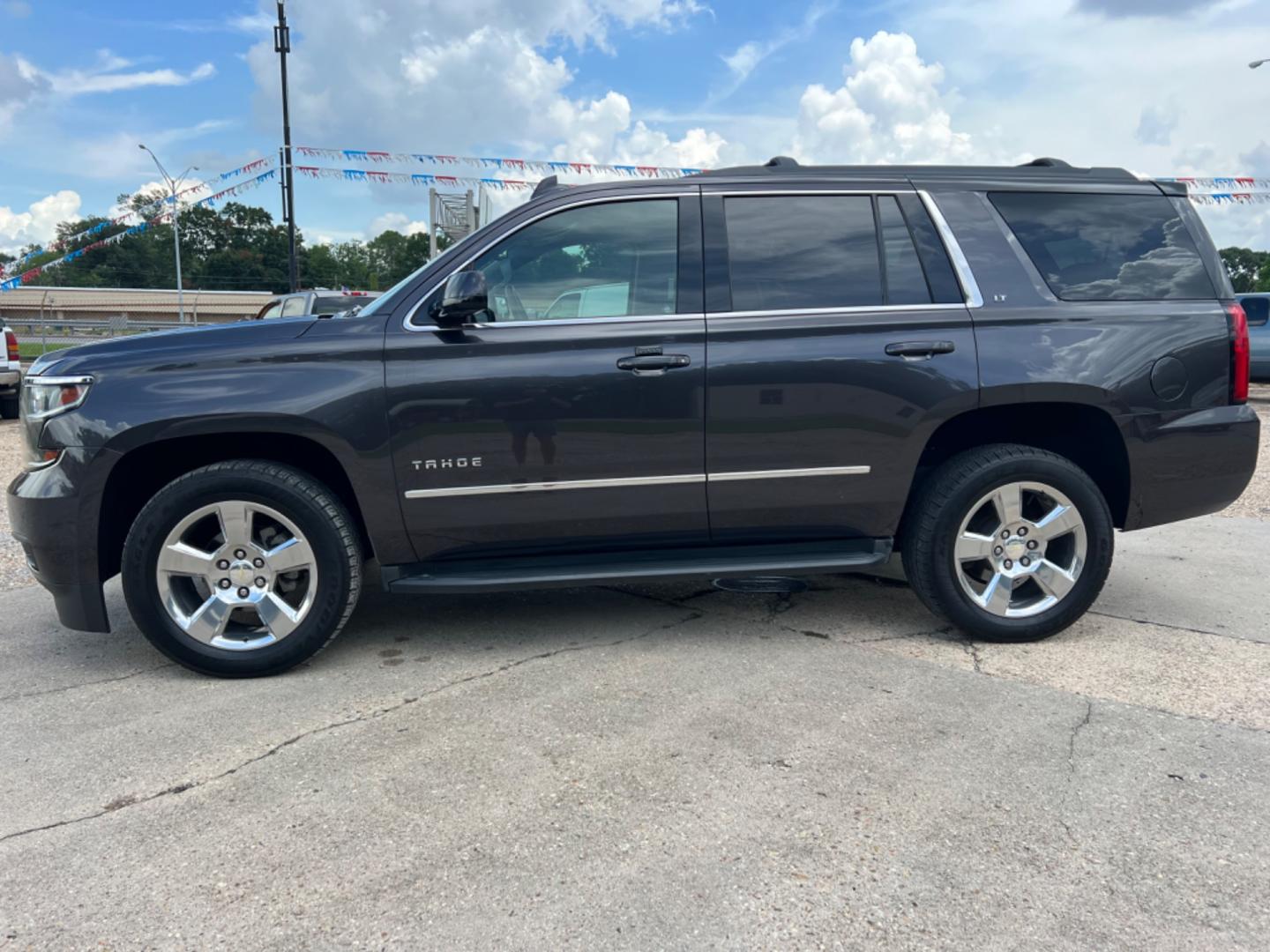 2017 Grey /Silver Chevrolet Tahoe LT (1GNSCBKC6HR) with an 5.3L V8 engine, 6-Speed Automatic transmission, located at 4520 Airline Hwy, Baton Rouge, LA, 70805, (225) 357-1497, 30.509325, -91.145432 - 2017 Chevrolet Tahoe LT **One Owner & No Accidents** 5.3 V8 Gas, 171K Miles, Heated Leather, Navigation, Seating For 7, All Power, Cold A/C, Power Lift Gate, Tow Pkg. FOR INFO PLEASE CONTACT JEFF AT 225 357-1497 CHECK OUT OUR A+ RATING WITH THE BETTER BUSINESS BUREAU WE HAVE BEEN A FAMILY OWNED AND - Photo#1