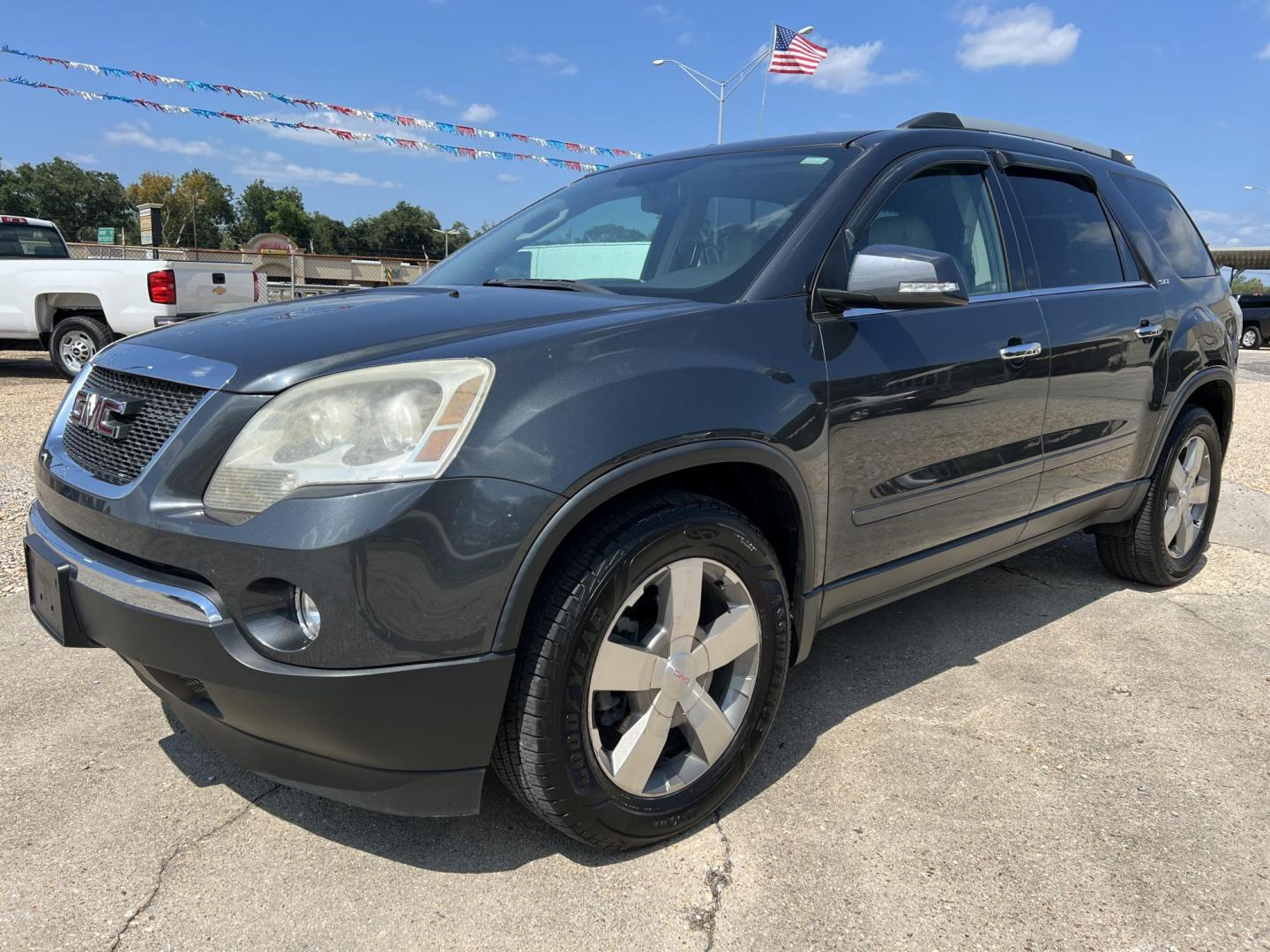 2011 Dark Gray /Silver GMC Acadia SLT-1 FWD (1GKKRRED8BJ) with an 3.6L V6 DOHC 24V engine, 6-Speed Automatic transmission, located at 4520 Airline Hwy, Baton Rouge, LA, 70805, (225) 357-1497, 30.509325, -91.145432 - 2011 GMC Acadia SLT 3.6 V6 Gas, 174K Miles, No Accidents, Cold A/C, Leather Seats, Power Windows, Locks & Mirrors, Cold A/C. FOR INFO PLEASE CONTACT JEFF AT 225 357-1497 CHECK OUT OUR A+ RATING WITH THE BETTER BUSINESS BUREAU WE HAVE BEEN A FAMILY OWNED AND OPERATED BUSINESS AT THE SAME LOCATION F - Photo#0