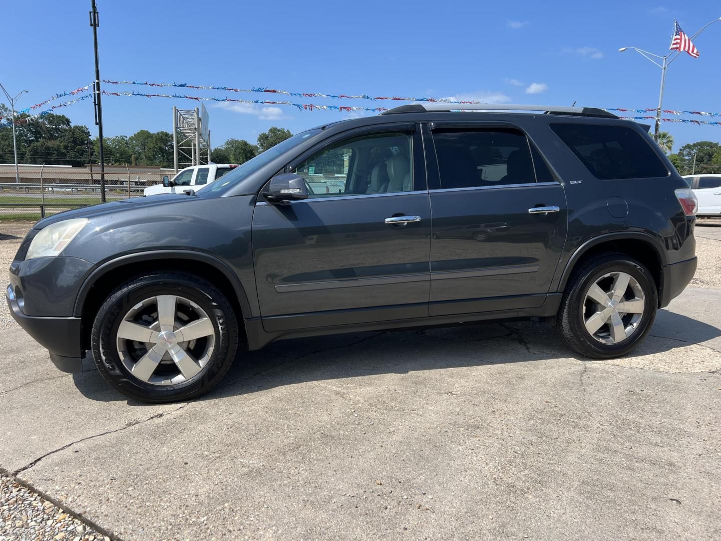 2011 Dark Gray /Silver GMC Acadia SLT-1 FWD (1GKKRRED8BJ) with an 3.6L V6 DOHC 24V engine, 6-Speed Automatic transmission, located at 4520 Airline Hwy, Baton Rouge, LA, 70805, (225) 357-1497, 30.509325, -91.145432 - 2011 GMC Acadia SLT 3.6 V6 Gas, 174K Miles, No Accidents, Cold A/C, Leather Seats, Power Windows, Locks & Mirrors, Cold A/C. FOR INFO PLEASE CONTACT JEFF AT 225 357-1497 CHECK OUT OUR A+ RATING WITH THE BETTER BUSINESS BUREAU WE HAVE BEEN A FAMILY OWNED AND OPERATED BUSINESS AT THE SAME LOCATION F - Photo#1