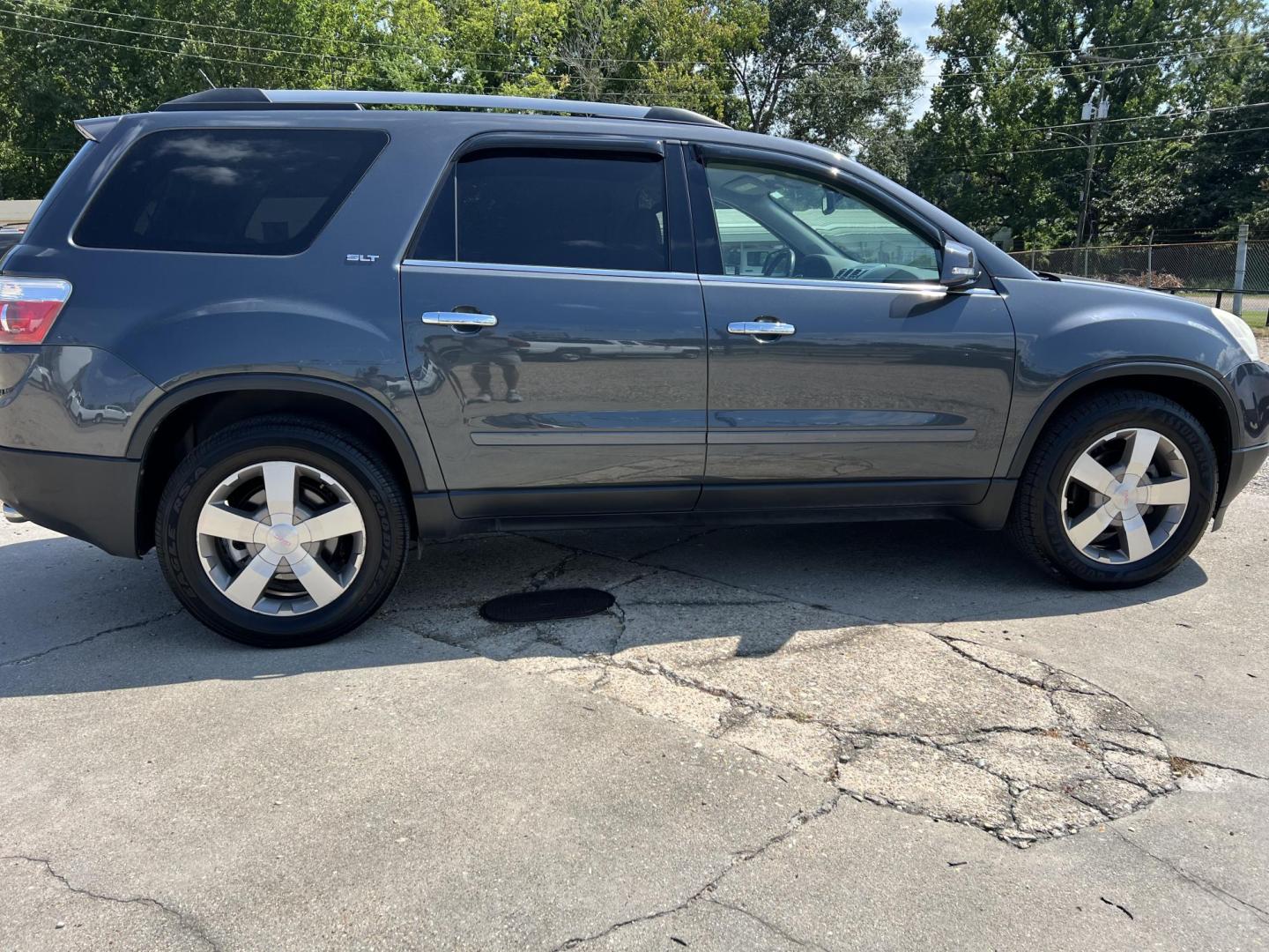 2011 Dark Gray /Silver GMC Acadia SLT-1 FWD (1GKKRRED8BJ) with an 3.6L V6 DOHC 24V engine, 6-Speed Automatic transmission, located at 4520 Airline Hwy, Baton Rouge, LA, 70805, (225) 357-1497, 30.509325, -91.145432 - 2011 GMC Acadia SLT 3.6 V6 Gas, 174K Miles, No Accidents, Cold A/C, Leather Seats, Power Windows, Locks & Mirrors, Cold A/C. FOR INFO PLEASE CONTACT JEFF AT 225 357-1497 CHECK OUT OUR A+ RATING WITH THE BETTER BUSINESS BUREAU WE HAVE BEEN A FAMILY OWNED AND OPERATED BUSINESS AT THE SAME LOCATION F - Photo#4