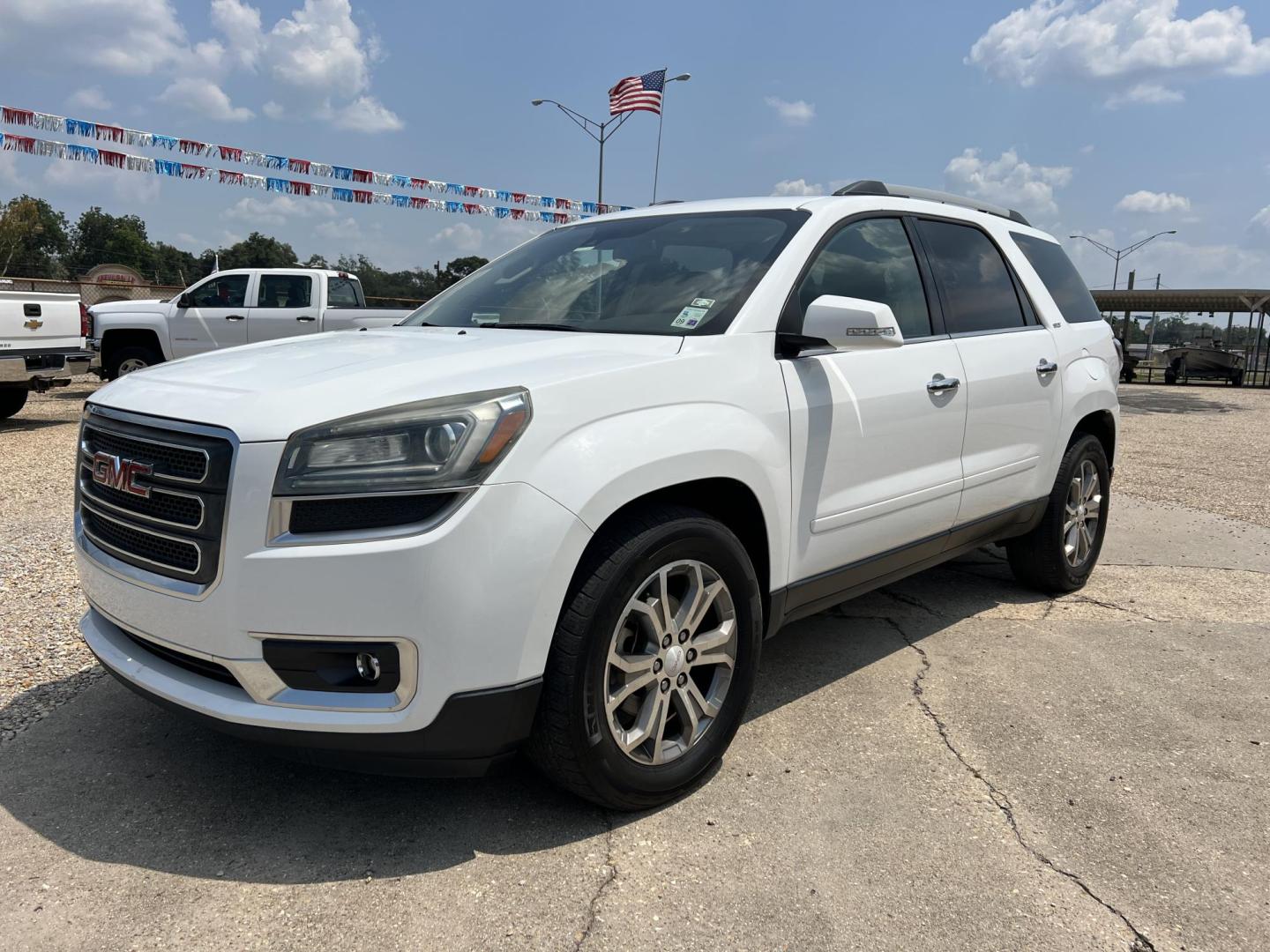 2016 White /Tan GMC Acadia SLT-1 FWD (1GKKRRKD1GJ) with an 3.6L V6 DOHC 24V engine, 6-Speed Automatic transmission, located at 4520 Airline Hwy, Baton Rouge, LA, 70805, (225) 357-1497, 30.509325, -91.145432 - 2016 GMC Acadia SLT 3.6 V6 Gas, 152K Miles, No Accidents, Cold A/C, Sunroof, DVD, Leather Seats, Power Windows, Locks & Mirrors & Much More. FOR INFO PLEASE CONTACT JEFF AT 225 357-1497 CHECK OUT OUR A+ RATING WITH THE BETTER BUSINESS BUREAU WE HAVE BEEN A FAMILY OWNED AND OPERATED BUSINESS AT THE S - Photo#0