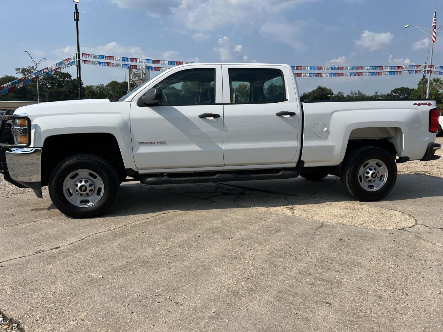 2017 White /Gray Chevrolet Silverado 2500HD Work Truck (1GC1KUEG0HF) with an 6.0L V8 Gas engine, 6-Speed Automatic transmission, located at 4520 Airline Hwy, Baton Rouge, LA, 70805, (225) 357-1497, 30.509325, -91.145432 - 2017 Chevrolet Silverado 2500HD Crew Cab 4WD, 6.0 V8 Gas, 169K Miles, Manual 4WD Shift On The Floor, Power Windows & Locks, Cold A/C, New Tires, Retrax Bed Cover, Spray In Liner. FOR INFO PLEASE CONTACT JEFF AT 225 357-1497 CHECK OUT OUR A+ RATING WITH THE BETTER BUSINESS BUREAU WE HAVE BEEN A FAMIL - Photo#1