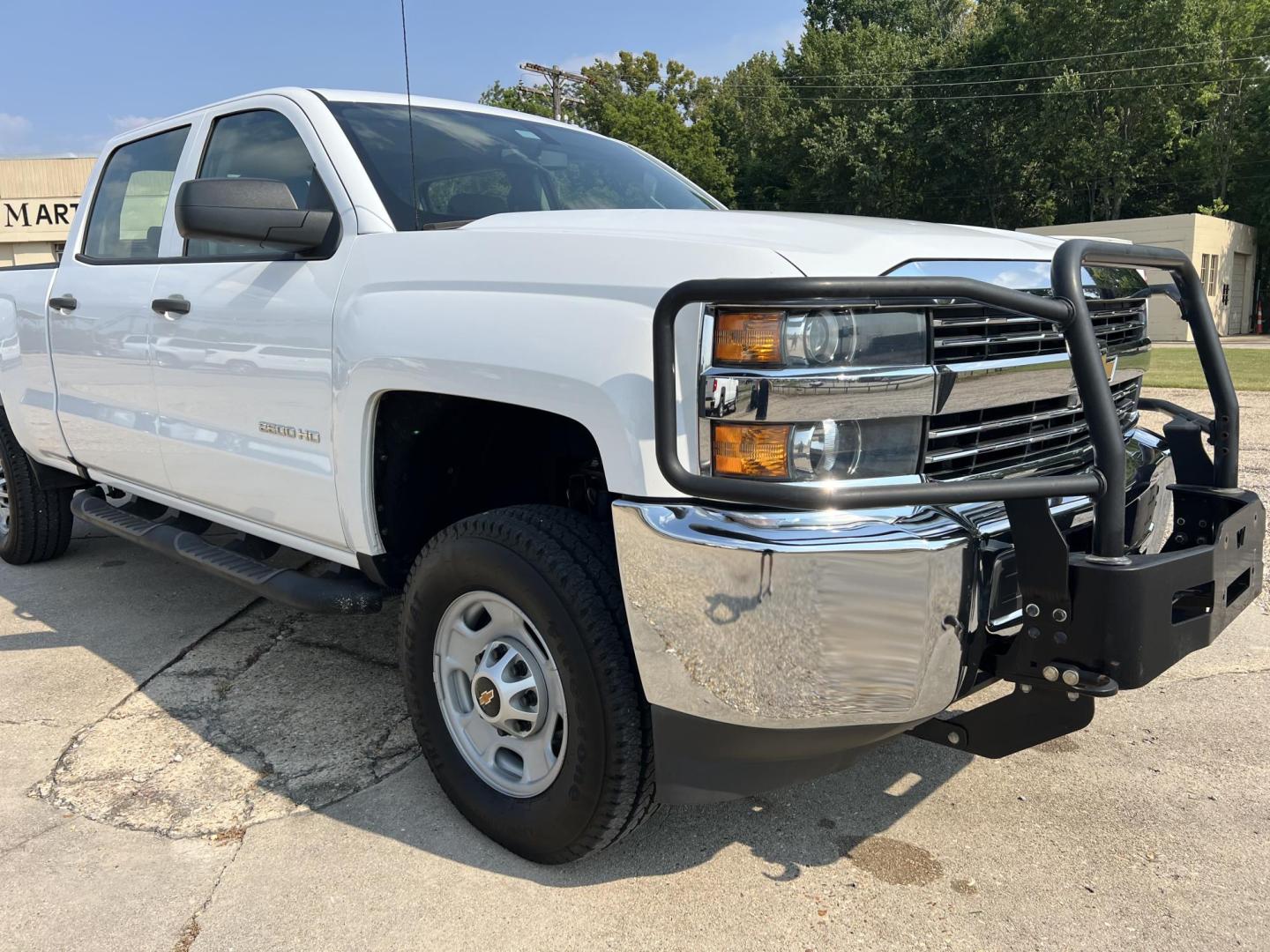 2017 White /Gray Chevrolet Silverado 2500HD Work Truck (1GC1KUEG0HF) with an 6.0L V8 Gas engine, 6-Speed Automatic transmission, located at 4520 Airline Hwy, Baton Rouge, LA, 70805, (225) 357-1497, 30.509325, -91.145432 - 2017 Chevrolet Silverado 2500HD Crew Cab 4WD, 6.0 V8 Gas, 169K Miles, Manual 4WD Shift On The Floor, Power Windows & Locks, Cold A/C, New Tires, Retrax Bed Cover, Spray In Liner. FOR INFO PLEASE CONTACT JEFF AT 225 357-1497 CHECK OUT OUR A+ RATING WITH THE BETTER BUSINESS BUREAU WE HAVE BEEN A FAMIL - Photo#3