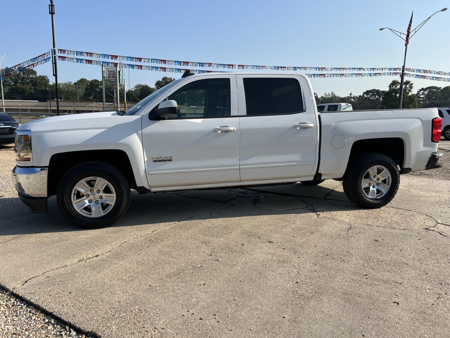 2017 White /Black Chevrolet Silverado 1500 LT (3GCPCREC3HG) with an 5.3L V8 engine, 6-Speed Automatic transmission, located at 4520 Airline Hwy, Baton Rouge, LA, 70805, (225) 357-1497, 30.509325, -91.145432 - 2017 Chevrolet Silverado Crew Cab LT ***ONE OWNER & NO ACCIDENTS*** 5.3 V8 Gas, 170K Miles, Leather, Power Windows & Locks, Cold A/C, Tow Pkg. Has Minor Dings & Scratches. FOR INFO PLEASE CONTACT JEFF AT 225 357-1497 CHECK OUT OUR A+ RATING WITH THE BETTER BUSINESS BUREAU WE HAVE BEEN A FAMILY OWNE - Photo#1