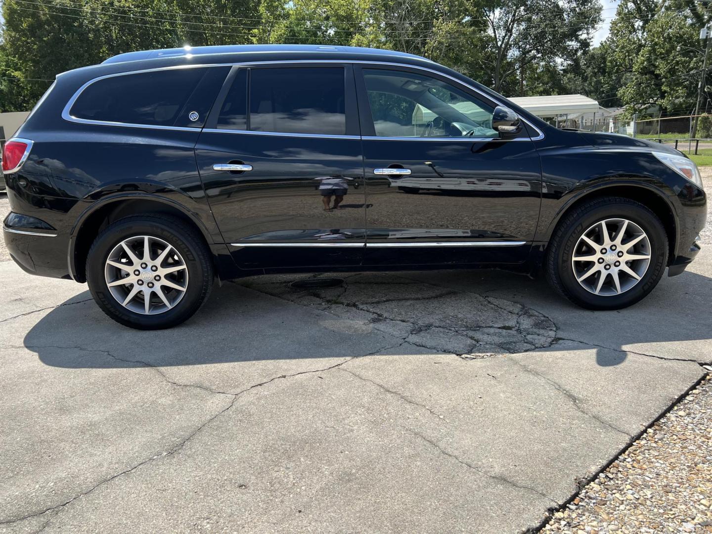 2017 Black /Black Buick Enclave Leather (5GAKRBKD1HJ) with an 3.6L V6 DOHC 24V engine, 6-Speed Automatic transmission, located at 4520 Airline Hwy, Baton Rouge, LA, 70805, (225) 357-1497, 30.509325, -91.145432 - 2017 Buick Enclave 3.6 V6 Gas, 152K Miles, Automatic, Dual A/C, Leather, Seats 7, All Power. Has Minor Scratches. FOR INFO PLEASE CONTACT JEFF AT 225-413-0981 CHECK OUT OUR A+ RATING WITH THE BETTER BUSINESS BUREAU WE HAVE BEEN A FAMILY OWNED AND OPERATED BUSINESS AT THE SAME LOCATION FOR OVER 45 Y - Photo#4