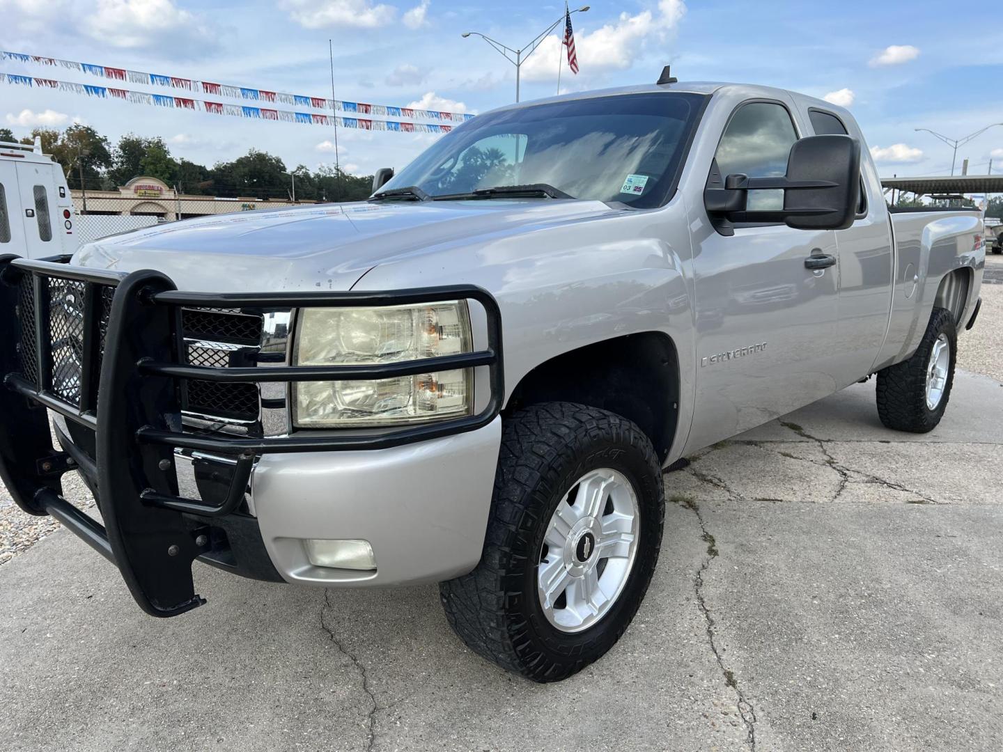 2007 Tan /Gray Chevrolet Silverado 1500 LT1 (2GCEK19JX71) with an 5.3L V8 engine, 4-Speed Automatic Overdrive transmission, located at 4520 Airline Hwy, Baton Rouge, LA, 70805, (225) 357-1497, 30.509325, -91.145432 - 2007 Chevy Silverado Ext Cab LT 4WD Z71 5.3 V8 Gas, 165K Miles, Power Windows & Locks, Spray In Bedliner, Tow Pkg. Hood & Top Have Some Fade To Them. FOR INFO PLEASE CONTACT JEFF AT 225-413-0981 CHECK OUT OUR A+ RATING WITH THE BETTER BUSINESS BUREAU WE HAVE BEEN A FAMILY OWNED AND OPERATED BUSINESS - Photo#0