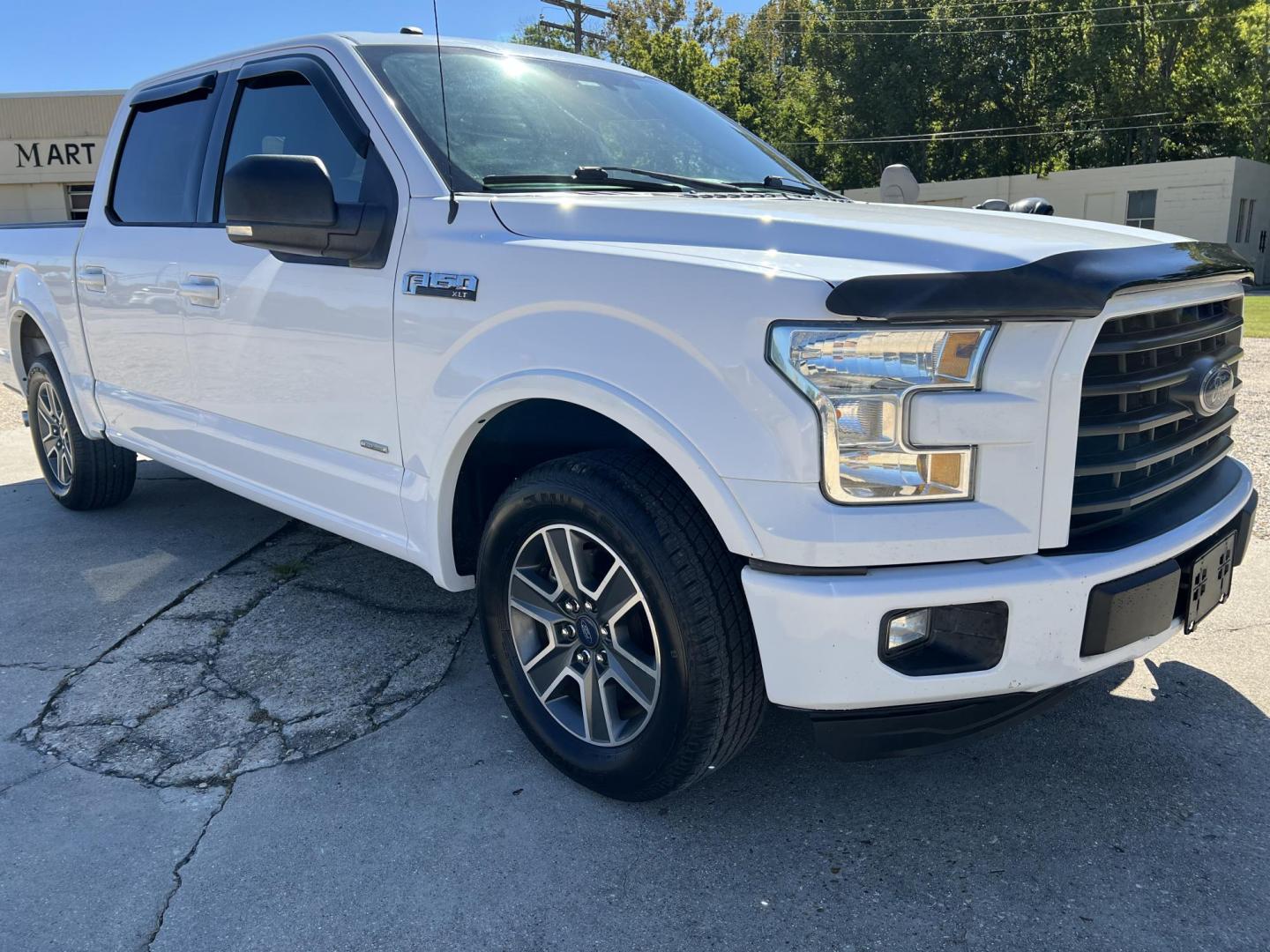 2016 White /Gray Ford F-150 XLT Sport (1FTEW1CP5GK) with an 2.7L V6 DOHC 24V engine, 6-Speed Automatic transmission, located at 4520 Airline Hwy, Baton Rouge, LA, 70805, (225) 357-1497, 30.509325, -91.145432 - 2016 Ford F150 SuperCrew XLT Sport 2.7 V6 Gas, 120K Miles, Cold A/C, Power Windows & Locks, New Tires, Spray In Bedliner, Tow Pkg. Tailgate Paint Flaking On Top. FOR INFO PLEASE CONTACT JEFF AT 225-413-0981 CHECK OUT OUR A+ RATING WITH THE BETTER BUSINESS BUREAU WE HAVE BEEN A FAMILY OWNED AND OPER - Photo#3