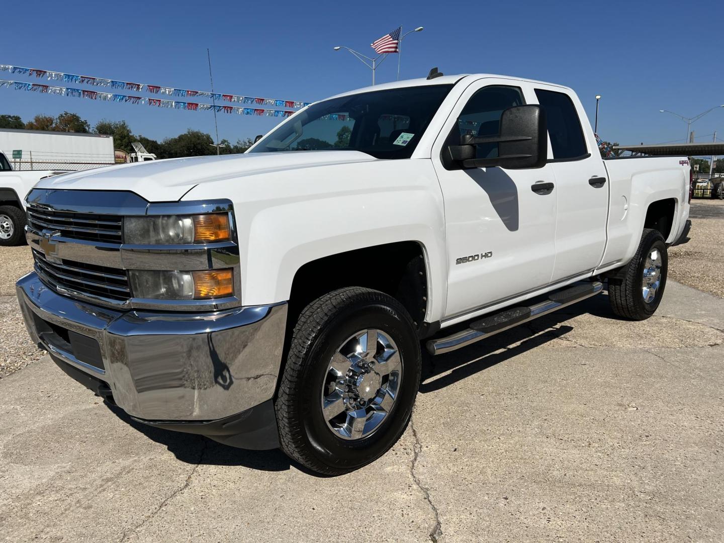 2015 White /Gray Chevrolet Silverado 2500HD LT (1GC2KVEG4FZ) with an 6.0L V8 engine, 6-Speed Automatic transmission, located at 4520 Airline Hwy, Baton Rouge, LA, 70805, (225) 357-1497, 30.509325, -91.145432 - 2015 Chevy 2500HD Double Cab LT 4X4 6.0 V8 Gas, 188K Miles, 6.5Ft Bed, Power Windows & Locks, New Tires, Tow Pkg. Has Some Minor Dent On Roof. FOR INFO PLEASE CONTACT JEFF AT 225-413-0981 CHECK OUT OUR A+ RATING WITH THE BETTER BUSINESS BUREAU WE HAVE BEEN A FAMILY OWNED AND OPERATED BUSINESS AT TH - Photo#0