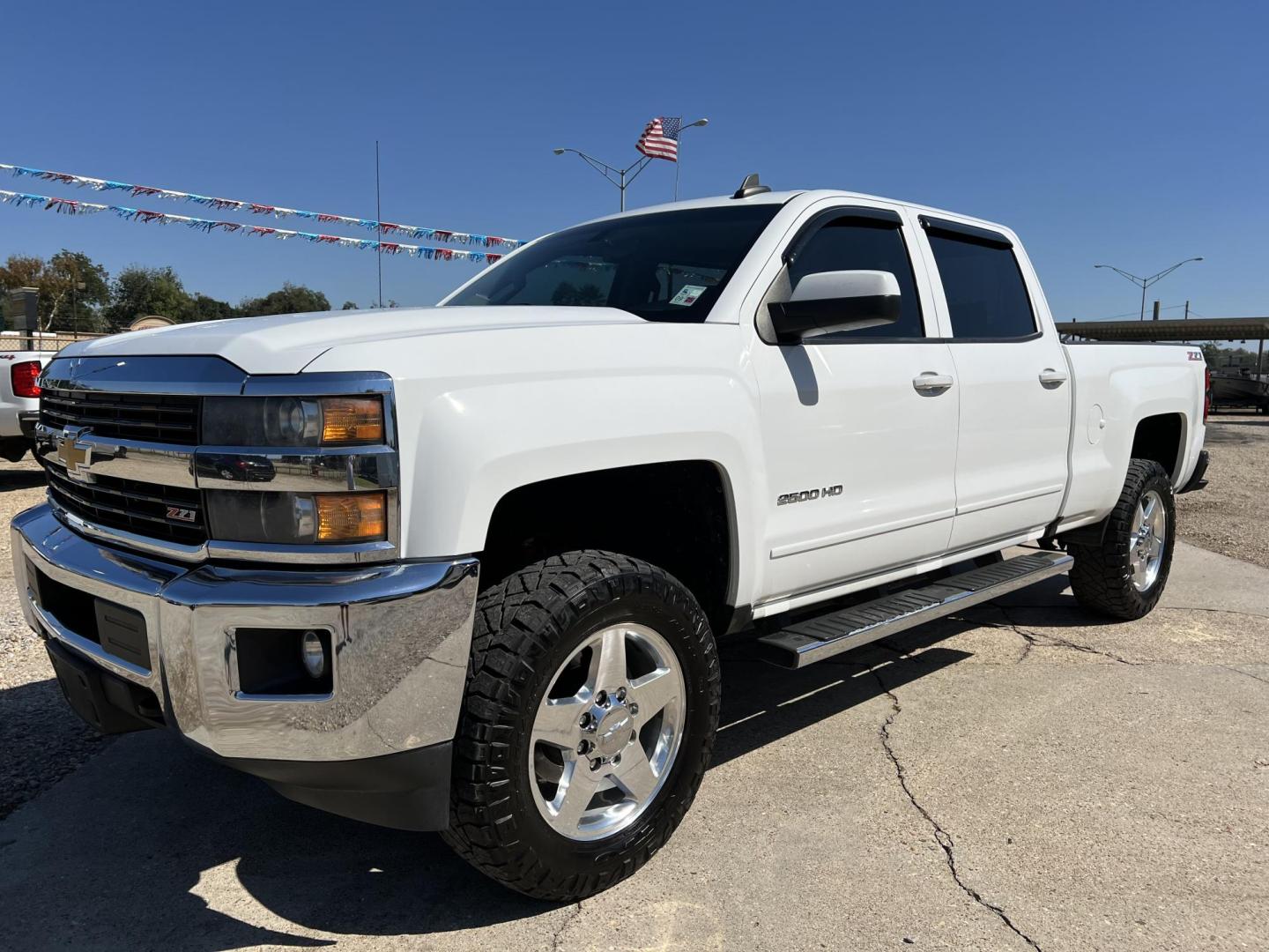 2015 White /Black Chevrolet Silverado 2500HD LT (1GC1KVEG4FF) with an 6.0L V8 engine, 6-Speed Automatic transmission, located at 4520 Airline Hwy, Baton Rouge, LA, 70805, (225) 357-1497, 30.509325, -91.145432 - 2015 Chevy 2500HD Crew Cab LT Z71 4X4 6.0 V8 Gas, 199K Miles, Heated Leather, Power Windows, Locks, Mirrors & Seat, Tow Pkg. FOR INFO PLEASE CONTACT JEFF AT 225-413-0981 CHECK OUT OUR A+ RATING WITH THE BETTER BUSINESS BUREAU WE HAVE BEEN A FAMILY OWNED AND OPERATED BUSINESS AT THE SAME LOCATION F - Photo#0