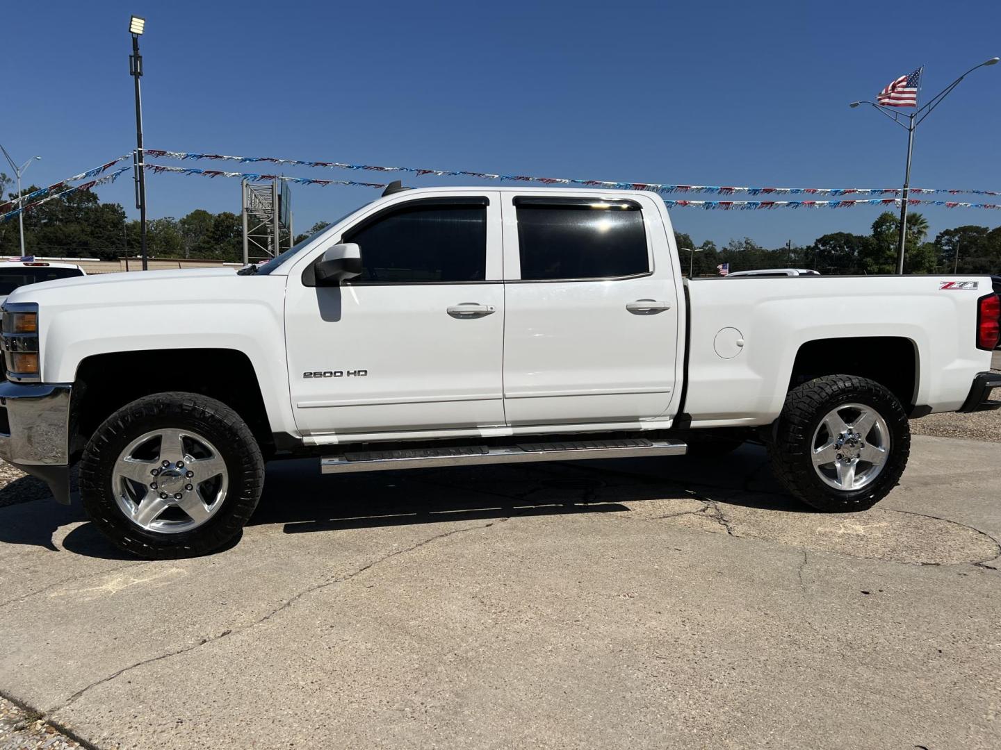 2015 White /Black Chevrolet Silverado 2500HD LT (1GC1KVEG4FF) with an 6.0L V8 engine, 6-Speed Automatic transmission, located at 4520 Airline Hwy, Baton Rouge, LA, 70805, (225) 357-1497, 30.509325, -91.145432 - 2015 Chevy 2500HD Crew Cab LT Z71 4X4 6.0 V8 Gas, 199K Miles, Heated Leather, Power Windows, Locks, Mirrors & Seat, Tow Pkg. FOR INFO PLEASE CONTACT JEFF AT 225-413-0981 CHECK OUT OUR A+ RATING WITH THE BETTER BUSINESS BUREAU WE HAVE BEEN A FAMILY OWNED AND OPERATED BUSINESS AT THE SAME LOCATION F - Photo#1