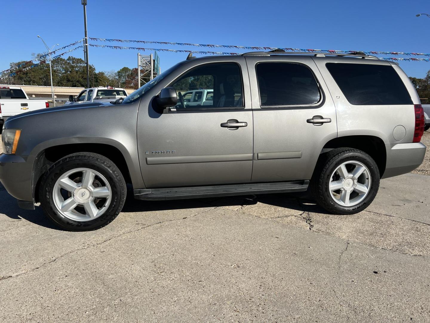 2007 Gray /Black Chevrolet Tahoe LT (1GNFC13JX7R) with an 5.3L V8 engine, 4-Speed Automatic Overdrive transmission, located at 4520 Airline Hwy, Baton Rouge, LA, 70805, (225) 357-1497, 30.509325, -91.145432 - 2007 Chevrolet Tahoe LT 5.3 V8 Gas, 137K Miles, Leather Interior, Seating For 8, Cold A/C & Heat, Power Windows, Locks, Mirrors & Seat, Towing Pkg. FOR INFO PLEASE CONTACT JEFF AT 225-413-0981 CHECK OUT OUR A+ RATING WITH THE BETTER BUSINESS BUREAU WE HAVE BEEN A FAMILY OWNED AND OPERATED BUSINESS A - Photo#1