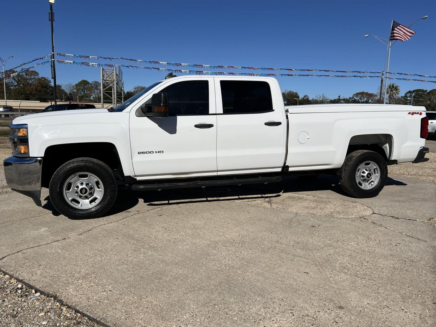 2018 White /Gray Chevrolet Silverado 2500HD Work Truck (1GC1KUEG9JF) with an 6.0L V8 engine, 6-Speed Automatic transmission, located at 4520 Airline Hwy, Baton Rouge, LA, 70805, (225) 357-1497, 30.509325, -91.145432 - 2018 Chevrolet Silverado 2500HD Crew Cab 4WD 8Ft Bed, 6.0 V8 Gas, 187K Miles, Cold A/C, Power Windows, Locks & Drivers Seat, Bed Cover, Weather Guard Box, Tow Pkg. Truck Has Minor Dings & Scratches. FOR INFO PLEASE CONTACT JEFF AT 225-413-0981 CHECK OUT OUR A+ RATING WITH THE BETTER BUSINESS BUREAU - Photo#1