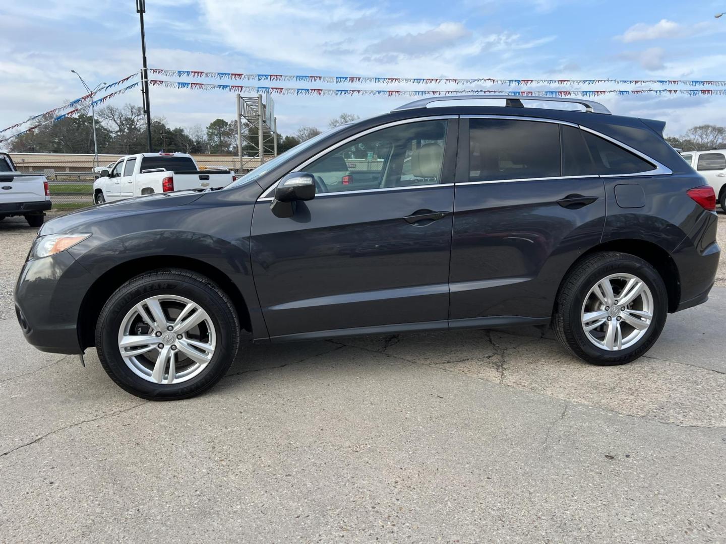 2014 Dark Gray /Gray Acura RDX (5J8TB3H30EL) with an 3.5 V6 engine, 6-Speed Automatic transmission, located at 4520 Airline Hwy, Baton Rouge, LA, 70805, (225) 357-1497, 30.509325, -91.145432 - 2014 Acura RDX **ONE OWNER** 3.5 V6 Gas, 141K Miles, Sunroof, Heated Leather Interior, Cold A/C & Heat, Power Windows, Locks, Mirrors & Seat, Rear Camera. FOR INFO PLEASE CONTACT JEFF AT 225-413-0981 CHECK OUT OUR A+ RATING WITH THE BETTER BUSINESS BUREAU WE HAVE BEEN A FAMILY OWNED AND OPERATED BUS - Photo#1