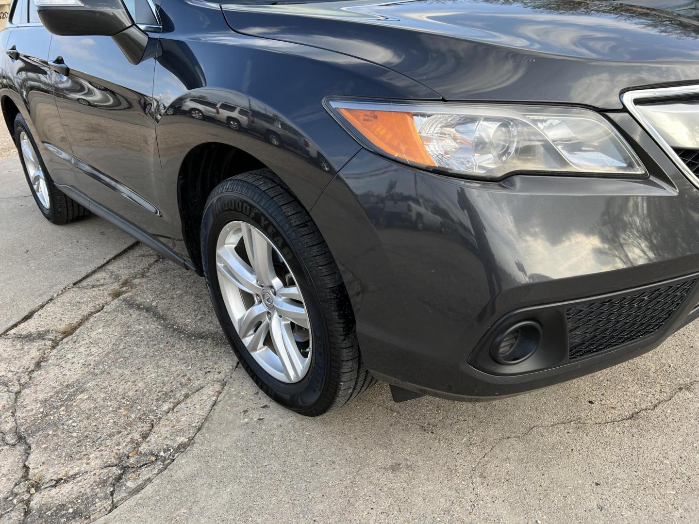 2014 Dark Gray /Gray Acura RDX (5J8TB3H30EL) with an 3.5 V6 engine, 6-Speed Automatic transmission, located at 4520 Airline Hwy, Baton Rouge, LA, 70805, (225) 357-1497, 30.509325, -91.145432 - 2014 Acura RDX **ONE OWNER** 3.5 V6 Gas, 141K Miles, Sunroof, Heated Leather Interior, Cold A/C & Heat, Power Windows, Locks, Mirrors & Seat, Rear Camera. FOR INFO PLEASE CONTACT JEFF AT 225-413-0981 CHECK OUT OUR A+ RATING WITH THE BETTER BUSINESS BUREAU WE HAVE BEEN A FAMILY OWNED AND OPERATED BUS - Photo#3