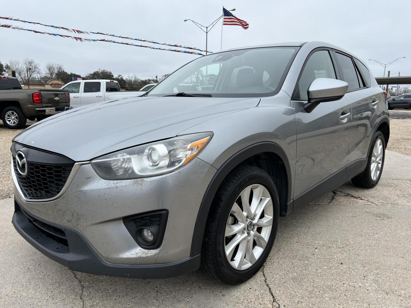 2014 Gray /Black Mazda CX-5 Grand Touring (JM3KE2DY2E0) with an 2.5L L4 DOHC 16V engine, 6-Speed Automatic transmission, located at 4520 Airline Hwy, Baton Rouge, LA, 70805, (225) 357-1497, 30.509325, -91.145432 - 2014 Mazda CX-5 Grand Touring **ONE OWNER** 2.5 4 Cylinder Gas, 162K Miles, Sunroof, Heated Leather Interior, Cold A/C & Heat, Power Windows, Locks, Mirrors & Seat. Front Bumper Has Cracks In Clear Factory Installed Bug Protector. FOR INFO PLEASE CONTACT JEFF AT 225-413-0981 CHECK OUT OUR A+ RATING - Photo#0