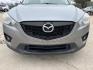 2014 Gray /Black Mazda CX-5 Grand Touring (JM3KE2DY2E0) with an 2.5L L4 DOHC 16V engine, 6-Speed Automatic transmission, located at 4520 Airline Hwy, Baton Rouge, LA, 70805, (225) 357-1497, 30.509325, -91.145432 - 2014 Mazda CX-5 Grand Touring **ONE OWNER** 2.5 4 Cylinder Gas, 162K Miles, Sunroof, Heated Leather Interior, Cold A/C & Heat, Power Windows, Locks, Mirrors & Seat. Front Bumper Has Cracks In Clear Factory Installed Bug Protector. FOR INFO PLEASE CONTACT JEFF AT 225-413-0981 CHECK OUT OUR A+ RATING - Photo#2