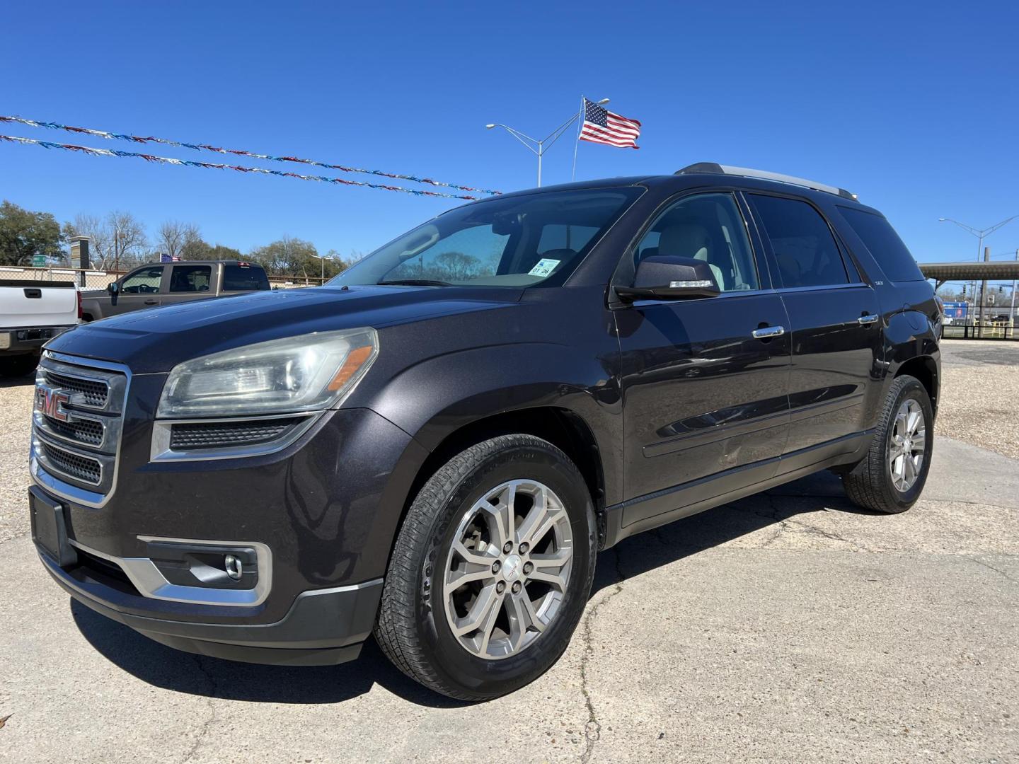 2015 Dark Gray /Gray GMC Acadia SLT-1 (1GKKRRKDXFJ) with an 3.6L V6 DOHC 24V engine, 6-Speed Automatic transmission, located at 4520 Airline Hwy, Baton Rouge, LA, 70805, (225) 357-1497, 30.509325, -91.145432 - 2015 GMC Acadia SLT **ONE OWNER & NO ACCIDENTS** 3.6 V6 Gas, 153K Miles, Heated Leather, 7 Passenger Seating, A/C & Heat, All Power, Bose Stereo, Power Lift Gate. FOR INFORMATION, PLEASE CONTACT JEFF AT 225-413-0981 CHECK OUT OUR A+ RATING WITH THE BETTER BUSINESS BUREAU WE HAVE BEEN A FAMILY OWNED - Photo#0