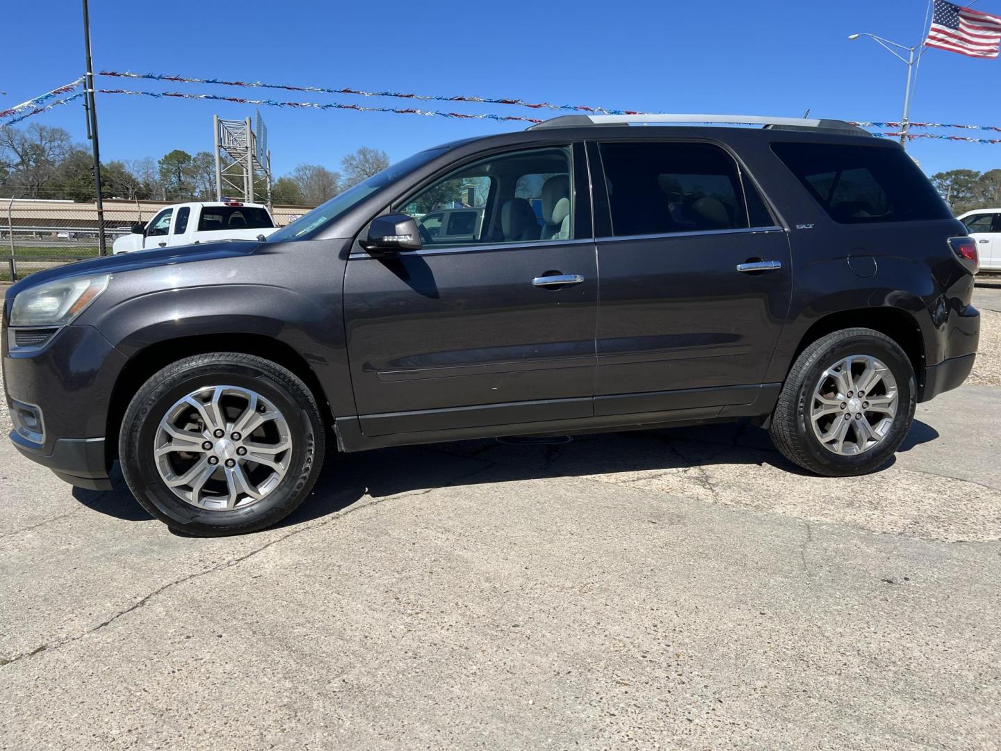 2015 Dark Gray /Gray GMC Acadia SLT-1 (1GKKRRKDXFJ) with an 3.6L V6 DOHC 24V engine, 6-Speed Automatic transmission, located at 4520 Airline Hwy, Baton Rouge, LA, 70805, (225) 357-1497, 30.509325, -91.145432 - 2015 GMC Acadia SLT **ONE OWNER & NO ACCIDENTS** 3.6 V6 Gas, 153K Miles, Heated Leather, 7 Passenger Seating, A/C & Heat, All Power, Bose Stereo, Power Lift Gate. FOR INFORMATION, PLEASE CONTACT JEFF AT 225-413-0981 CHECK OUT OUR A+ RATING WITH THE BETTER BUSINESS BUREAU WE HAVE BEEN A FAMILY OWNED - Photo#1