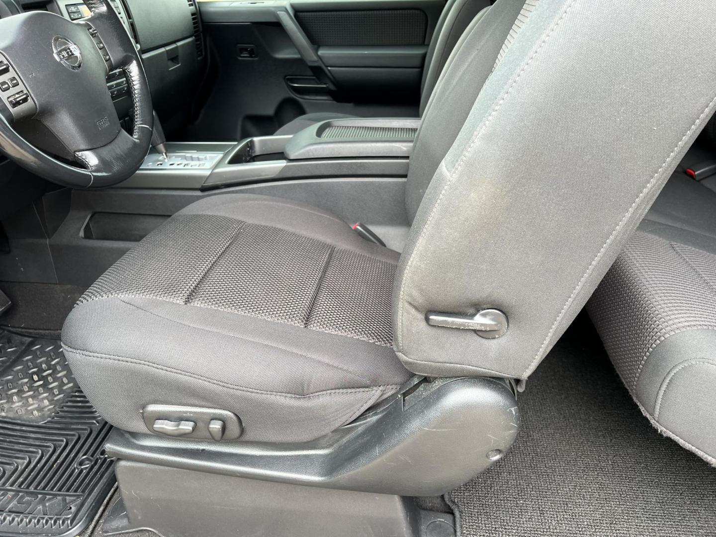 2008 Dark Gray /Gray Nissan Titan SE (1N6BA06F98N) with an 5.6L V8 engine, 5-Speed Automatic Overdrive transmission, located at 4520 Airline Hwy, Baton Rouge, LA, 70805, (225) 357-1497, 30.509325, -91.145432 - 2008 Nissan Titan King Cab SE 4WD 5.6L Gas, 215K Miles, Power Windows, Locks & Mirrors, A/C & Heat, Spray In Liner, Bed Cover, Towing Package, Truck Does Have Minor Dent IN Front Bumper. FOR INFORMATION, PLEASE CONTACT JEFF AT 225-413-0981 CHECK OUT OUR A+ RATING WITH THE BETTER BUSINESS BUREAU WE H - Photo#10