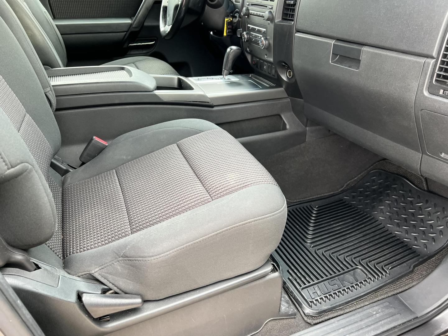 2008 Dark Gray /Gray Nissan Titan SE (1N6BA06F98N) with an 5.6L V8 engine, 5-Speed Automatic Overdrive transmission, located at 4520 Airline Hwy, Baton Rouge, LA, 70805, (225) 357-1497, 30.509325, -91.145432 - 2008 Nissan Titan King Cab SE 4WD 5.6L Gas, 215K Miles, Power Windows, Locks & Mirrors, A/C & Heat, Spray In Liner, Bed Cover, Towing Package, Truck Does Have Minor Dent IN Front Bumper. FOR INFORMATION, PLEASE CONTACT JEFF AT 225-413-0981 CHECK OUT OUR A+ RATING WITH THE BETTER BUSINESS BUREAU WE H - Photo#9