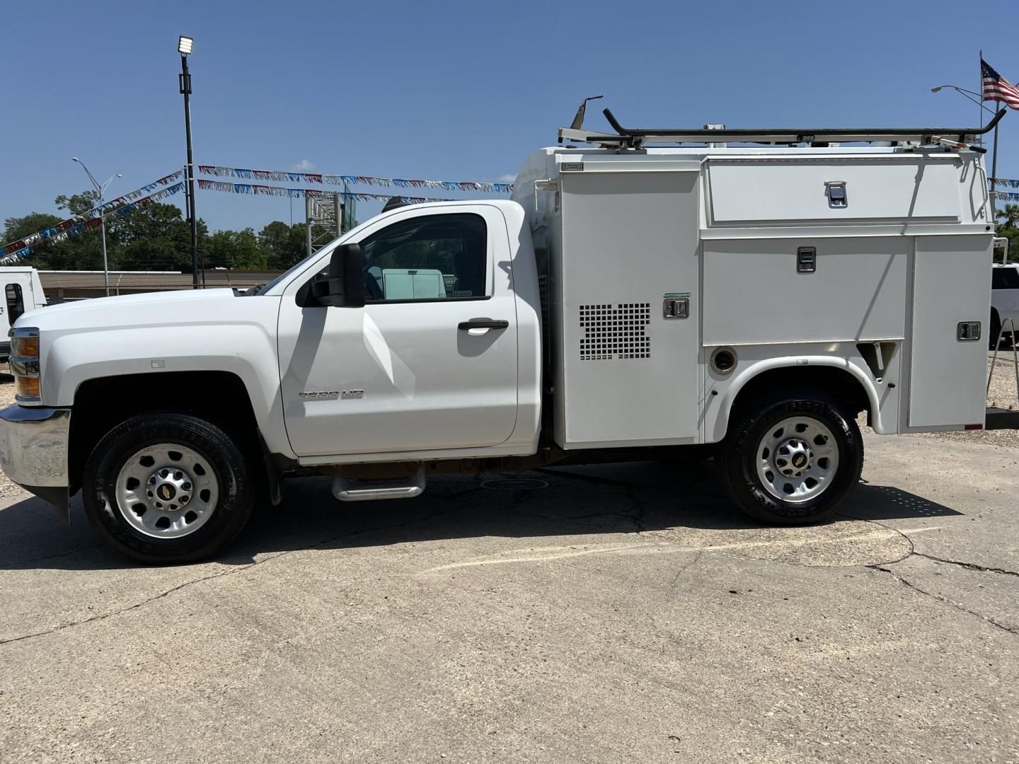 2015 White /Gray Chevrolet Silverado 3500HD Work Truck Long Box (1GB3CYCG9FZ) with an 6.0L V8 OHV 16V FFV engine, 6-Speed Automatic transmission, located at 4520 Airline Hwy, Baton Rouge, LA, 70805, (225) 357-1497, 30.509325, -91.145432 - 2015 Chevrolet Silverado 3500HD 2WD 6.0 V8 Gas, 149K Miles, Cold A/C, Power Locks, Knapheide Work Bed And Much More, Tow Pkg. FOR INFO PLEASE CONTACT JEFF AT 225-413-0981 CHECK OUT OUR A+ RATING WITH THE BETTER BUSINESS BUREAU WE HAVE BEEN A FAMILY OWNED AND OPERATED BUSINESS AT THE SAME LOCATION FO - Photo#1