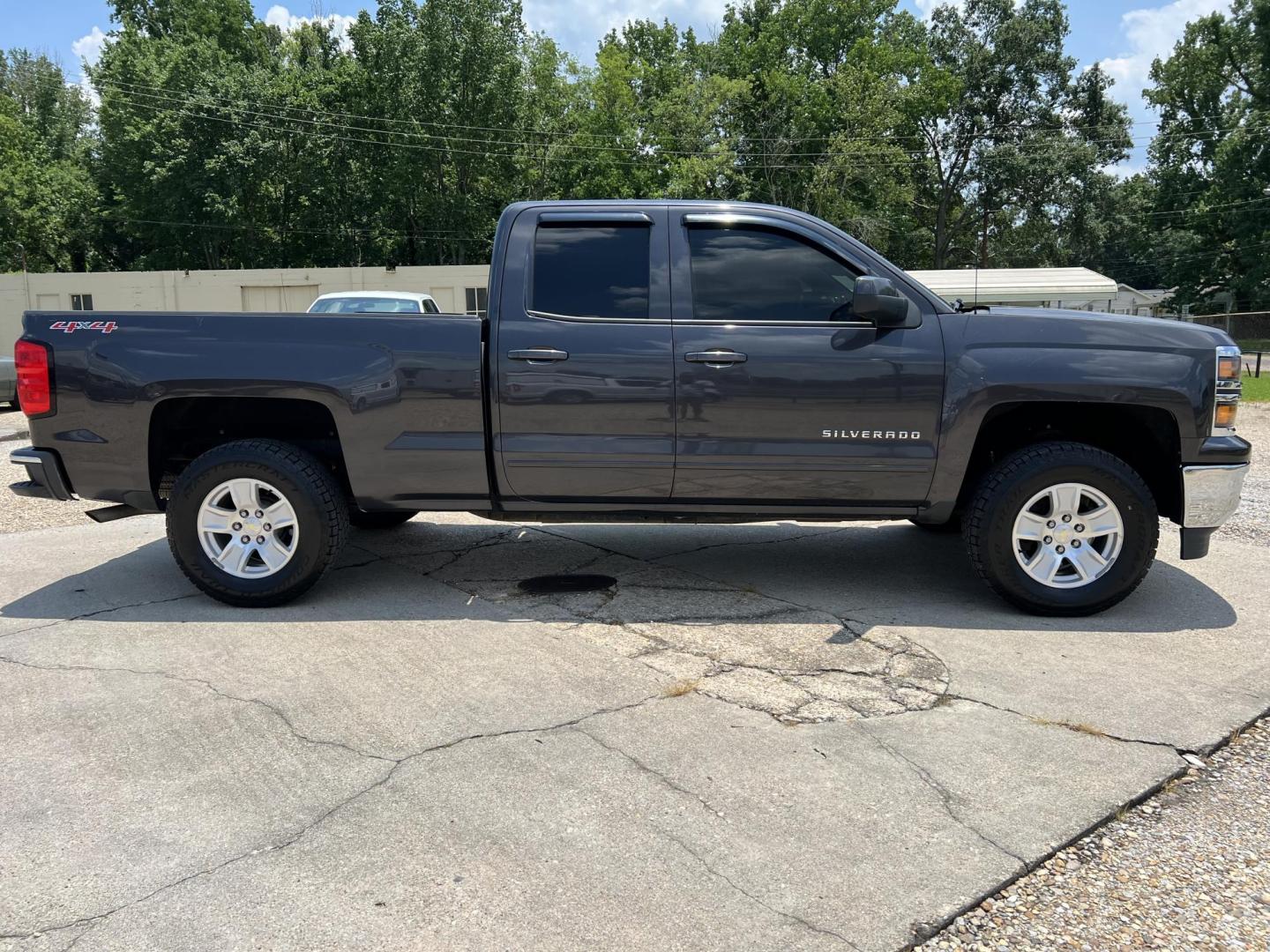 2015 Dark Gray /Gray Chevrolet Silverado 1500 LT (1GCVKREHXFZ) with an 4.3L V6 OHV 12V engine, 6-Speed Automatic transmission, located at 4520 Airline Hwy, Baton Rouge, LA, 70805, (225) 357-1497, 30.509325, -91.145432 - 2015 Chevrolet Silverado 1500 Double Cab LT 4X4 4.3 V6 Gas, 161K Miles, Cold A/C, Power Windows, Locks & Mirrors, Backup Camera, New Tires,Tow Package. Has Minor Dent On Roof. FOR INFO PLEASE CONTACT JEFF AT 225-413-0981 CHECK OUT OUR A+ RATING WITH THE BETTER BUSINESS BUREAU WE HAVE BEEN A FAMIL - Photo#4