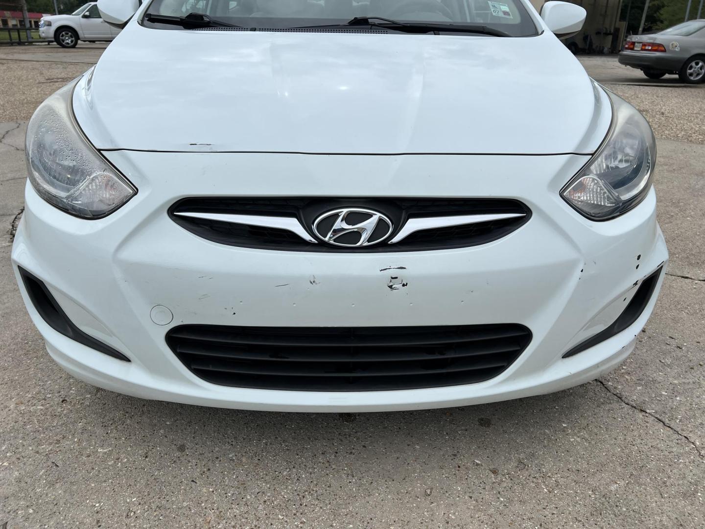 2014 White /Tan Hyundai Accent GLS (KMHCT4AE6EU) with an 1.6L L4 DOHC 16V engine, Automatic transmission, located at 4520 Airline Hwy, Baton Rouge, LA, 70805, (225) 357-1497, 30.509325, -91.145432 - 2014 Hyundai Accent GLS 1.6L Gas **ONLY 32K Miles** Cold A/C, Power Windows, Locks & Mirrors, Has A Couple Of Scuff Mark On Bumper. FOR INFO PLEASE CONTACT JEFF AT 225-413-0981 CHECK OUT OUR A+ RATING WITH THE BETTER BUSINESS BUREAU WE HAVE BEEN A FAMILY OWNED AND OPERATED BUSINESS AT THE SAME LOCA - Photo#2