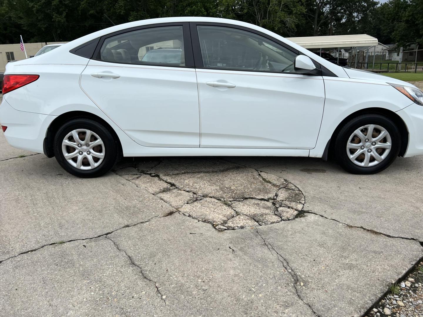 2014 White /Tan Hyundai Accent GLS (KMHCT4AE6EU) with an 1.6L L4 DOHC 16V engine, Automatic transmission, located at 4520 Airline Hwy, Baton Rouge, LA, 70805, (225) 357-1497, 30.509325, -91.145432 - 2014 Hyundai Accent GLS 1.6L Gas **ONLY 32K Miles** Cold A/C, Power Windows, Locks & Mirrors, Has A Couple Of Scuff Mark On Bumper. FOR INFO PLEASE CONTACT JEFF AT 225-413-0981 CHECK OUT OUR A+ RATING WITH THE BETTER BUSINESS BUREAU WE HAVE BEEN A FAMILY OWNED AND OPERATED BUSINESS AT THE SAME LOCA - Photo#4