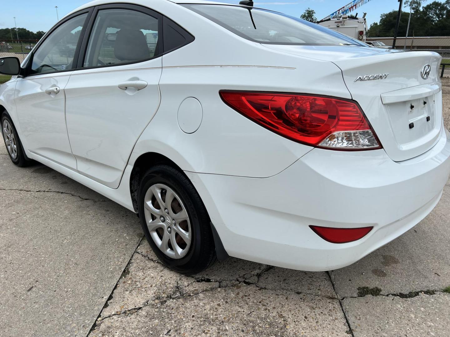 2014 White /Tan Hyundai Accent GLS (KMHCT4AE6EU) with an 1.6L L4 DOHC 16V engine, Automatic transmission, located at 4520 Airline Hwy, Baton Rouge, LA, 70805, (225) 357-1497, 30.509325, -91.145432 - 2014 Hyundai Accent GLS 1.6L Gas **ONLY 32K Miles** Cold A/C, Power Windows, Locks & Mirrors, Has A Couple Of Scuff Mark On Bumper. FOR INFO PLEASE CONTACT JEFF AT 225-413-0981 CHECK OUT OUR A+ RATING WITH THE BETTER BUSINESS BUREAU WE HAVE BEEN A FAMILY OWNED AND OPERATED BUSINESS AT THE SAME LOCA - Photo#7