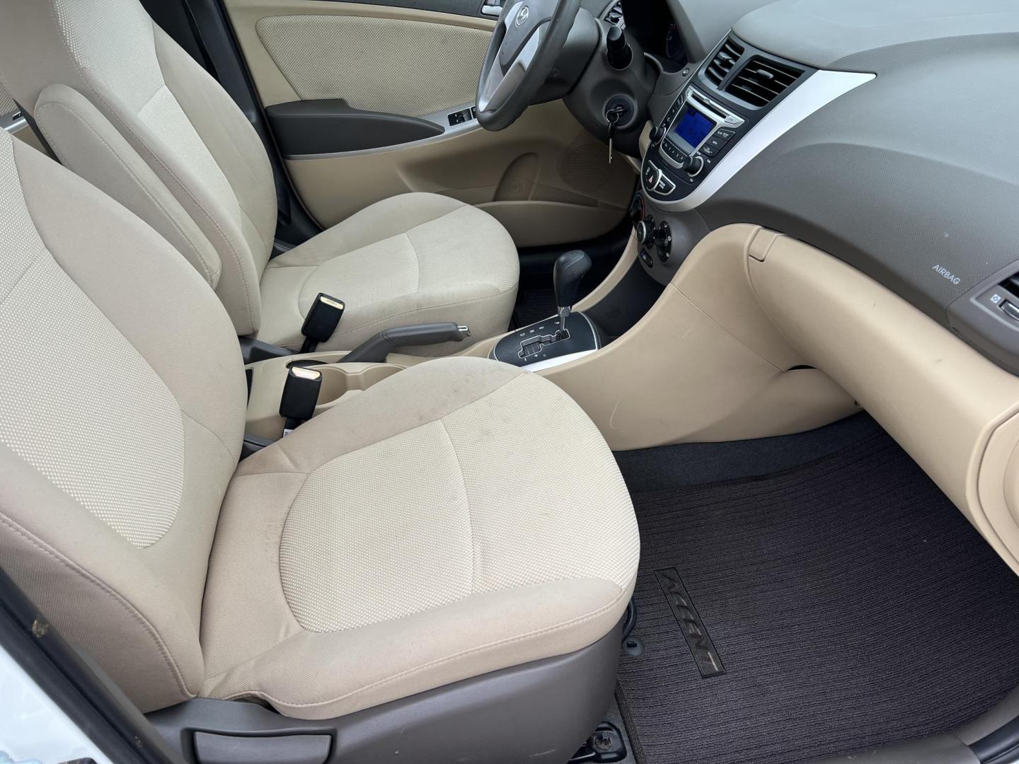 2014 White /Tan Hyundai Accent GLS (KMHCT4AE6EU) with an 1.6L L4 DOHC 16V engine, Automatic transmission, located at 4520 Airline Hwy, Baton Rouge, LA, 70805, (225) 357-1497, 30.509325, -91.145432 - 2014 Hyundai Accent GLS 1.6L Gas **ONLY 32K Miles** Cold A/C, Power Windows, Locks & Mirrors, Has A Couple Of Scuff Mark On Bumper. FOR INFO PLEASE CONTACT JEFF AT 225-413-0981 CHECK OUT OUR A+ RATING WITH THE BETTER BUSINESS BUREAU WE HAVE BEEN A FAMILY OWNED AND OPERATED BUSINESS AT THE SAME LOCA - Photo#9