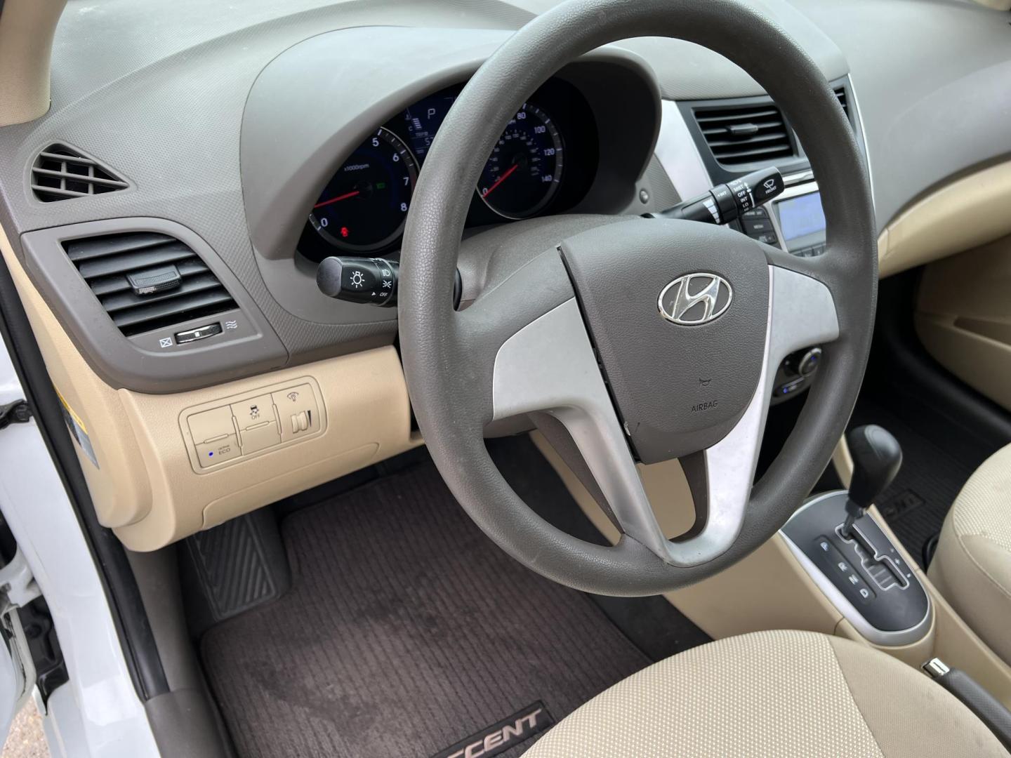 2014 White /Tan Hyundai Accent GLS (KMHCT4AE6EU) with an 1.6L L4 DOHC 16V engine, Automatic transmission, located at 4520 Airline Hwy, Baton Rouge, LA, 70805, (225) 357-1497, 30.509325, -91.145432 - 2014 Hyundai Accent GLS 1.6L Gas **ONLY 32K Miles** Cold A/C, Power Windows, Locks & Mirrors, Has A Couple Of Scuff Mark On Bumper. FOR INFO PLEASE CONTACT JEFF AT 225-413-0981 CHECK OUT OUR A+ RATING WITH THE BETTER BUSINESS BUREAU WE HAVE BEEN A FAMILY OWNED AND OPERATED BUSINESS AT THE SAME LOCA - Photo#12