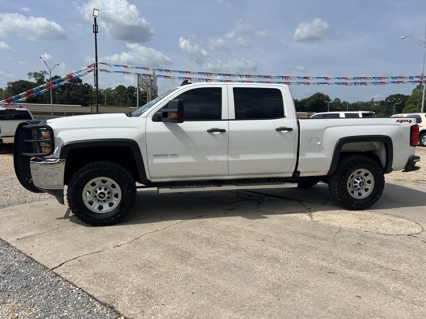2019 White /Gray Chevrolet Silverado 2500HD Work Truck (1GC1KREG1KF) with an 6.0L V8 engine, 6-Speed Automatic transmission, located at 4520 Airline Hwy, Baton Rouge, LA, 70805, (225) 357-1497, 30.509325, -91.145432 - 2019 Chevrolet Silverado 2500HD Crew Cab 4X4 **NO ACCIDENTS** 6.0 V8 Gas, 197K Miles, Cold A/C, Power Seat, Windows, Locks & Mirrors, Backup Camera, Spray In Bedliner, Good Tires, Tow Package. FOR INFO PLEASE CONTACT JEFF AT 225-413-0981. CHECK OUT OUR A+ RATING WITH THE BETTER BUSINESS BUREAU. WE- Photo#1